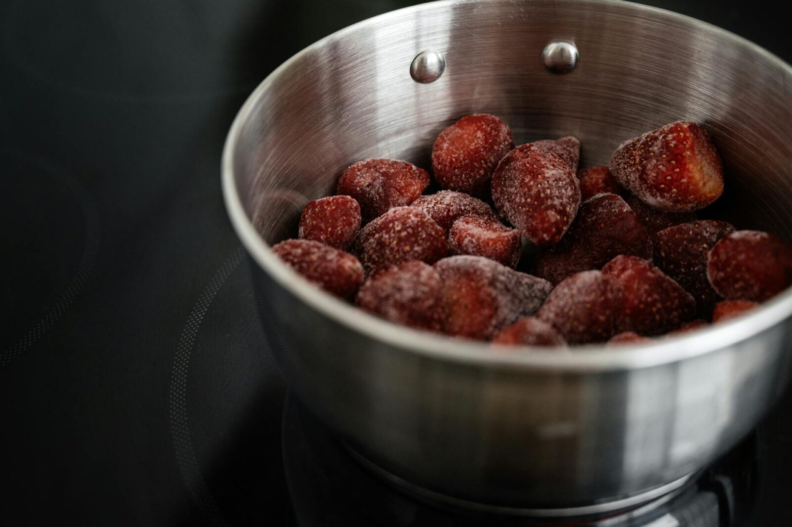 shiny metallic bowl with frozen strawberry 8 Ways to Preserve Your Harvest