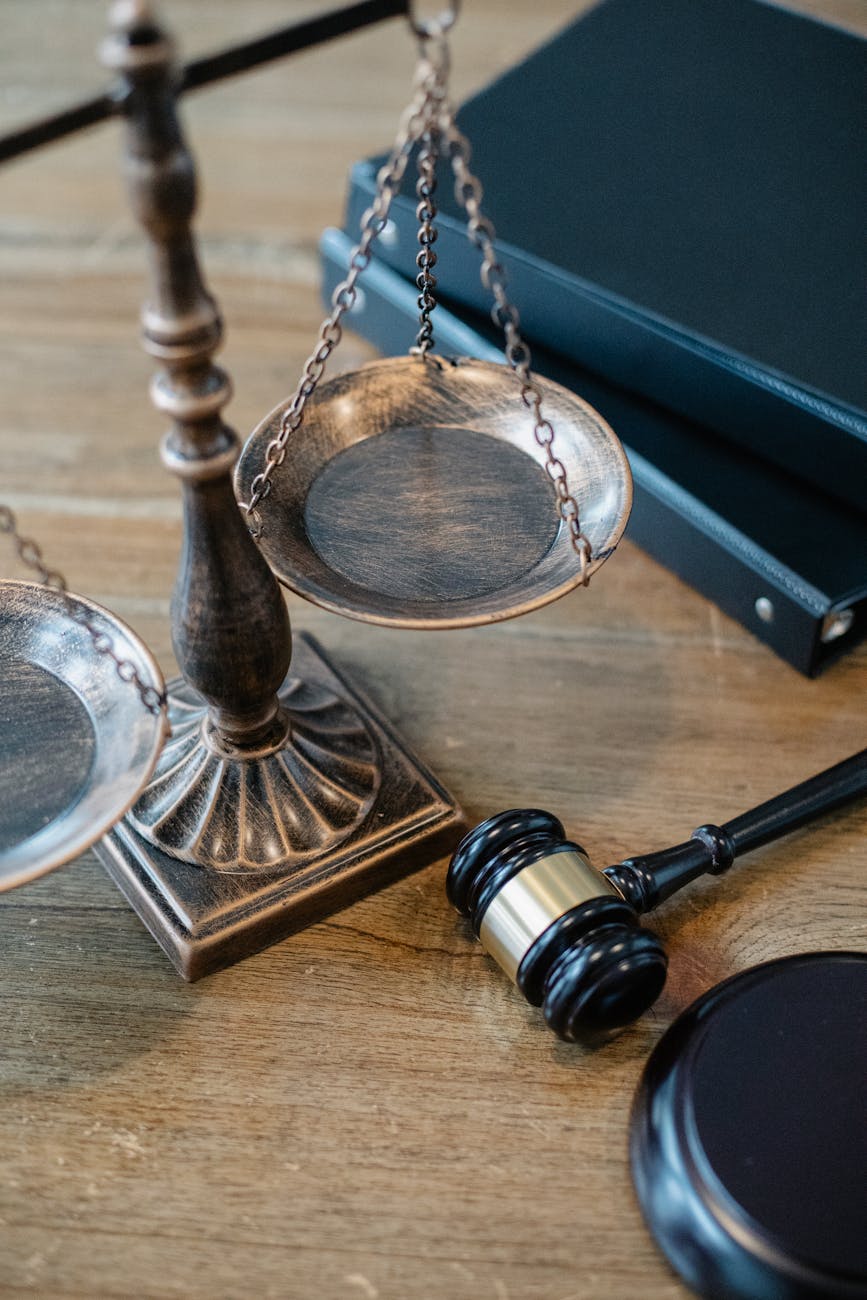 justice scales and gavel on wooden surface Blog Article Categories Legal