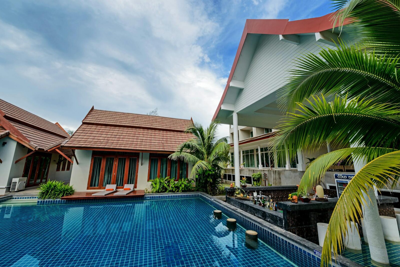 swimming pool near villas 10 Ways to Prep Your Vacation Rental Property for Guests