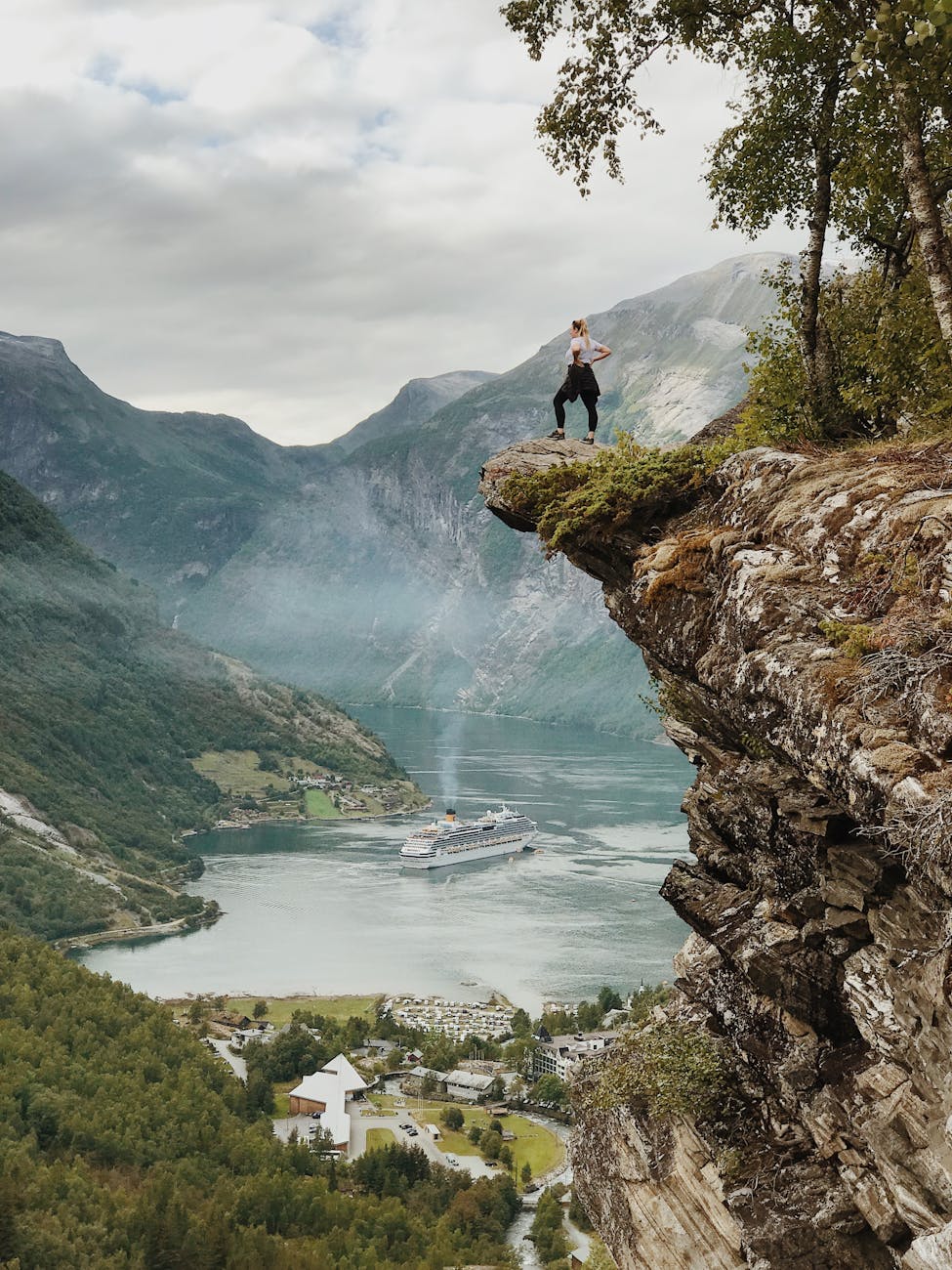 woman standing on the cliff The Best Strategies For Dealing With Loss