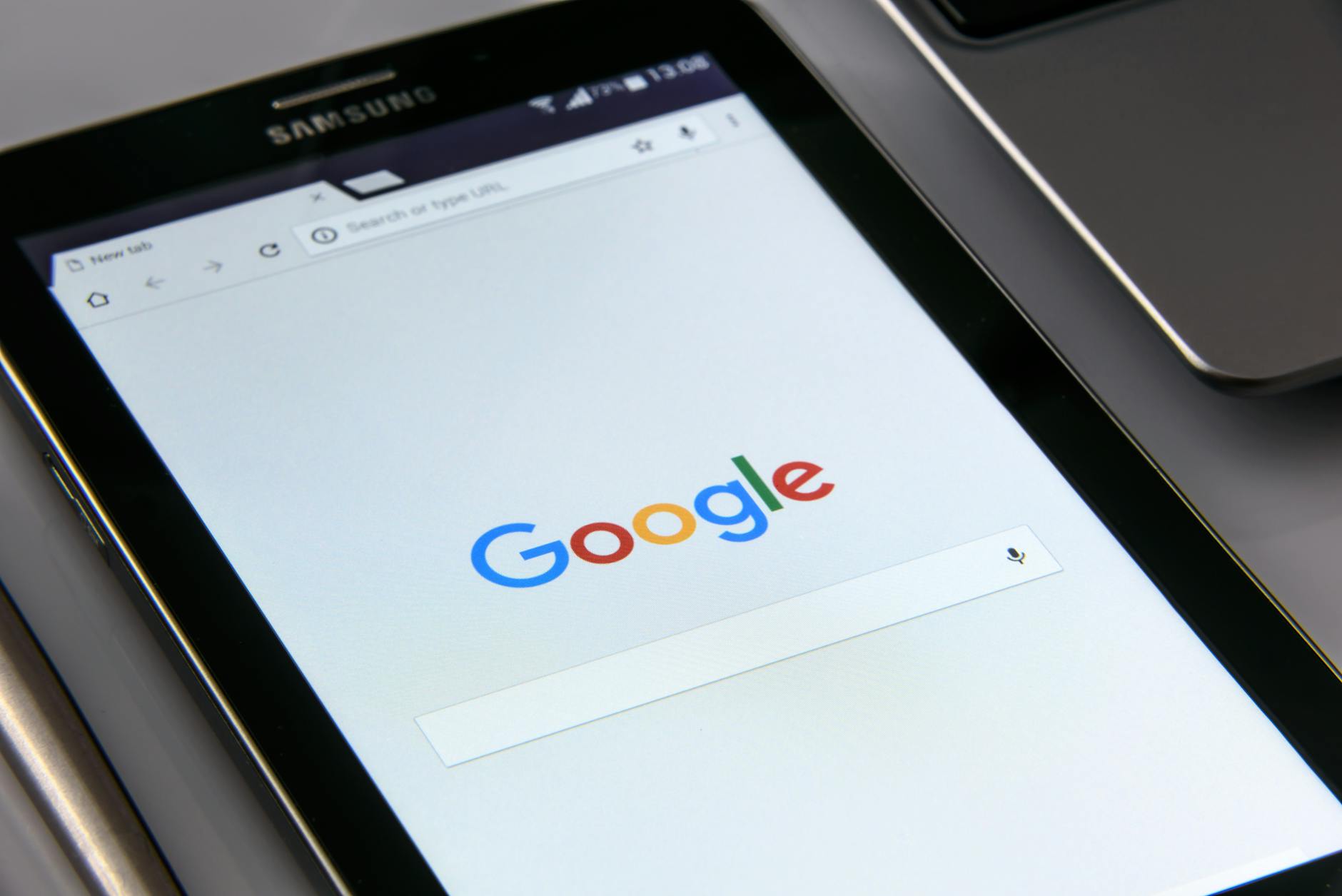 black samsung tablet display google browser on screen 7 Crucial Features You Need For A User-Friendly Business Website