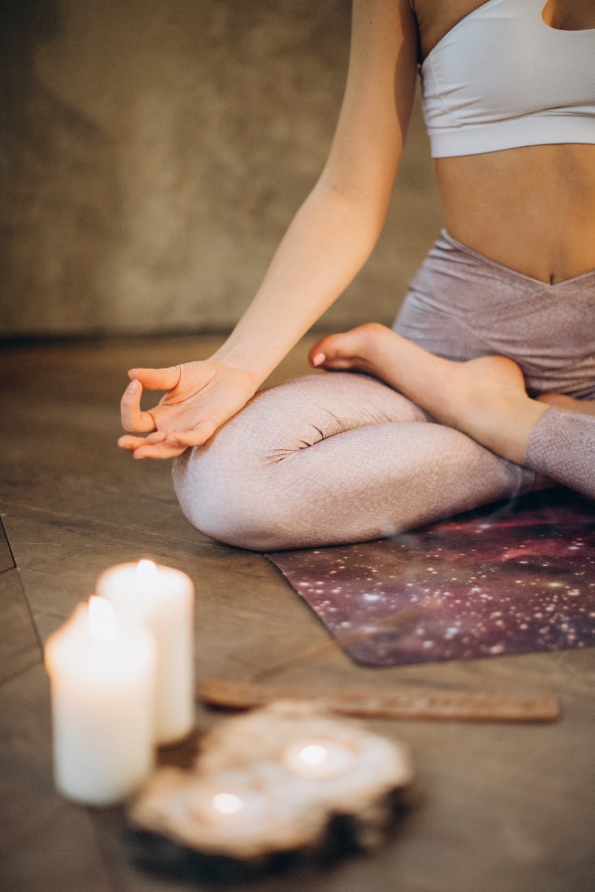 meditating with candles and incense hygge home design ideas to feed your mental health