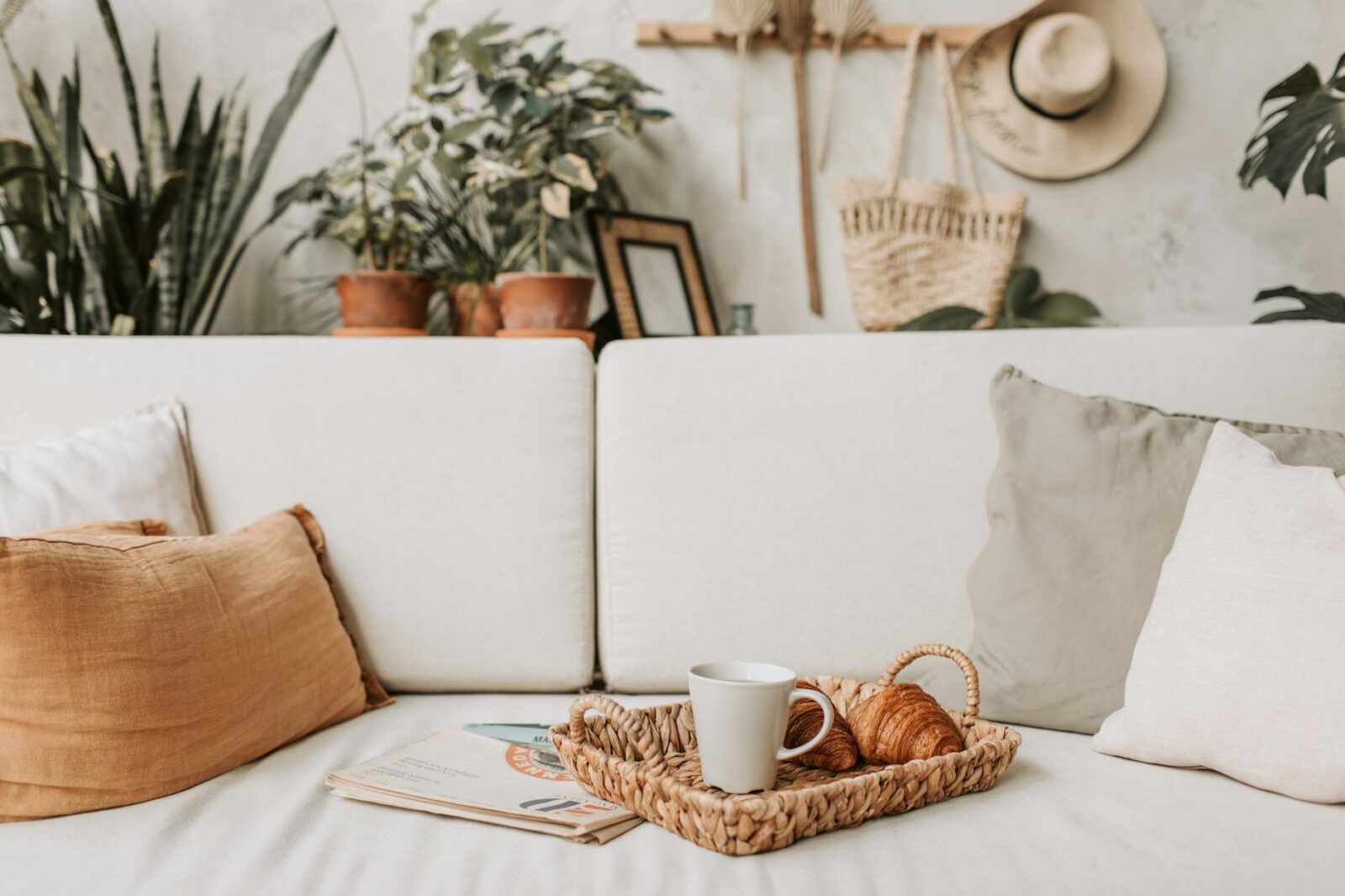 white ceramic mug on brown woven basket