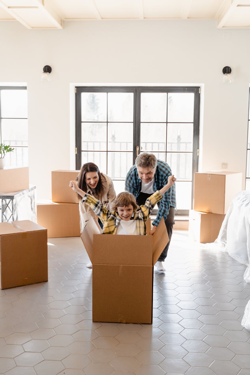 man and woman sitting on brown couch 6 strategies to sell your home fast