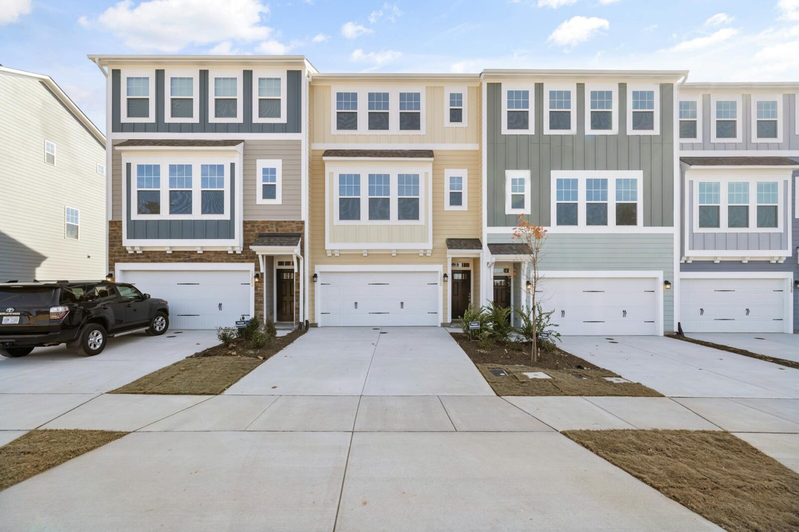 white concrete apartment buildings Profitable Real Estate Investment Strategies: Tools, Tech, and Resources