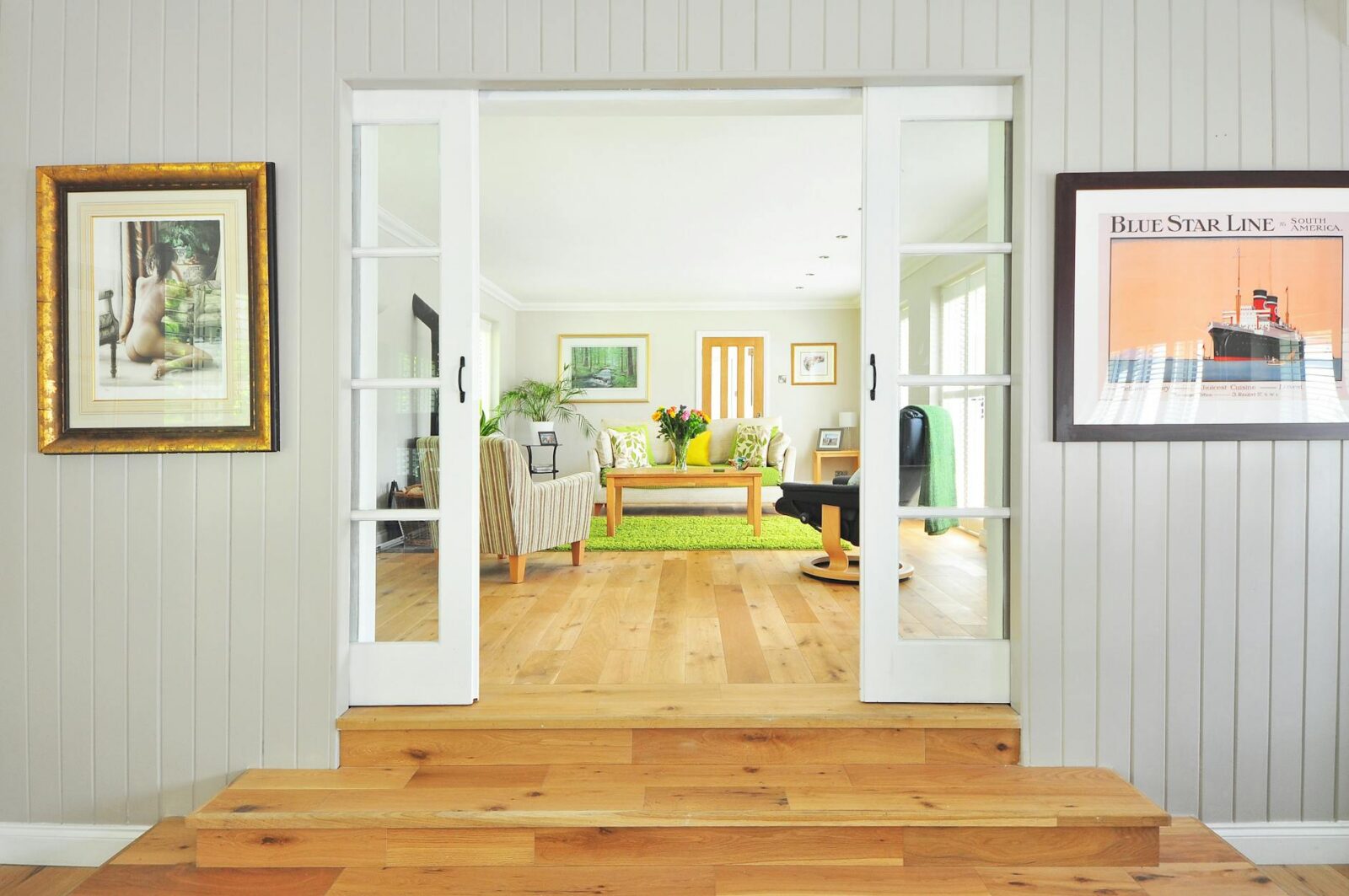 brown coffee table on green area rug Why Building Your Own Home Is Achievable and Affordable
