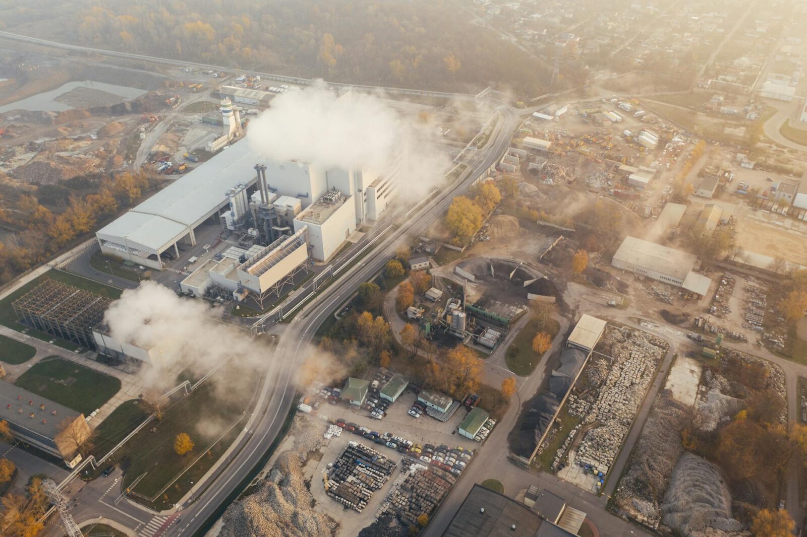 white smoke coming out from a building How To Make Your Company More Energy Efficient And Carbon-Friendly