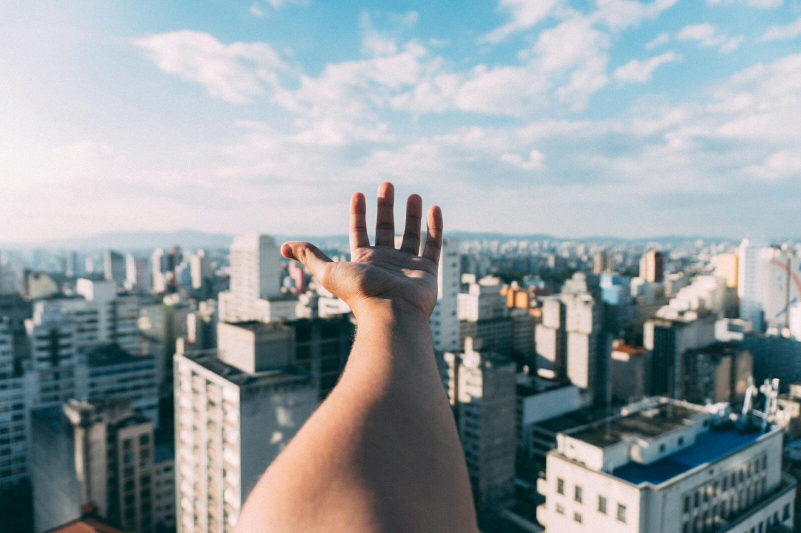 person raise his hand