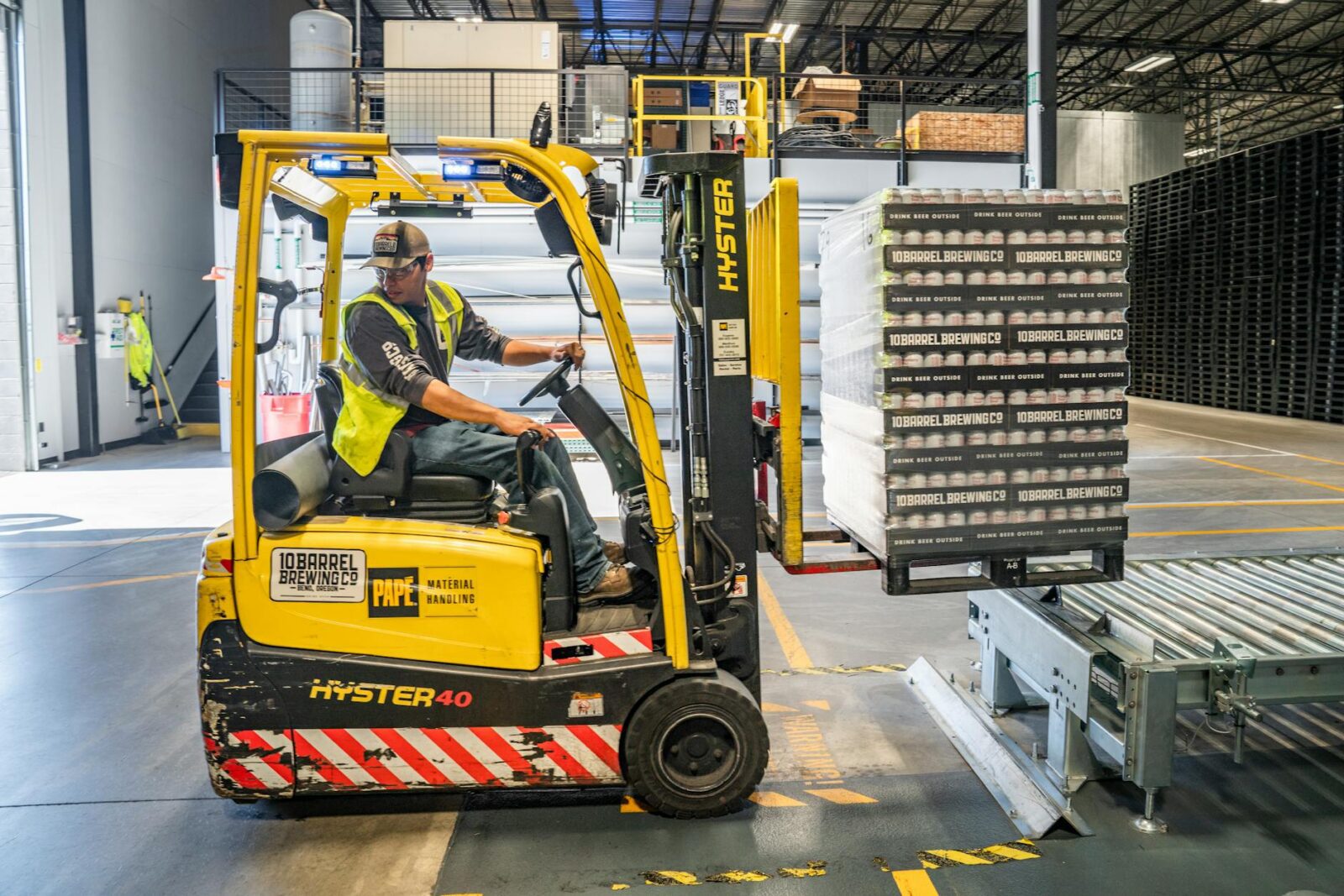person using forklift Top Commercial Real Estate Investment Strategies: Upgrades That Maximize ROI