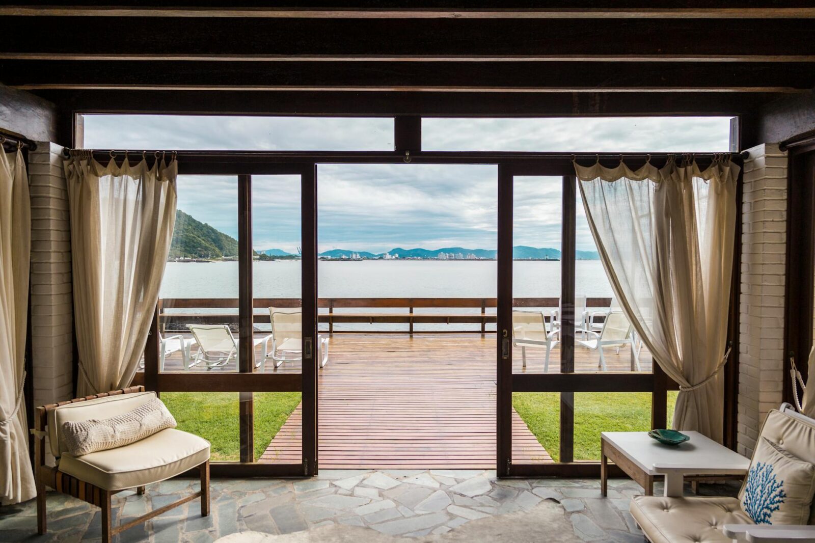 white curtains on window wall Buying a Home Overseas? Practical Tips for a Smart Purchase