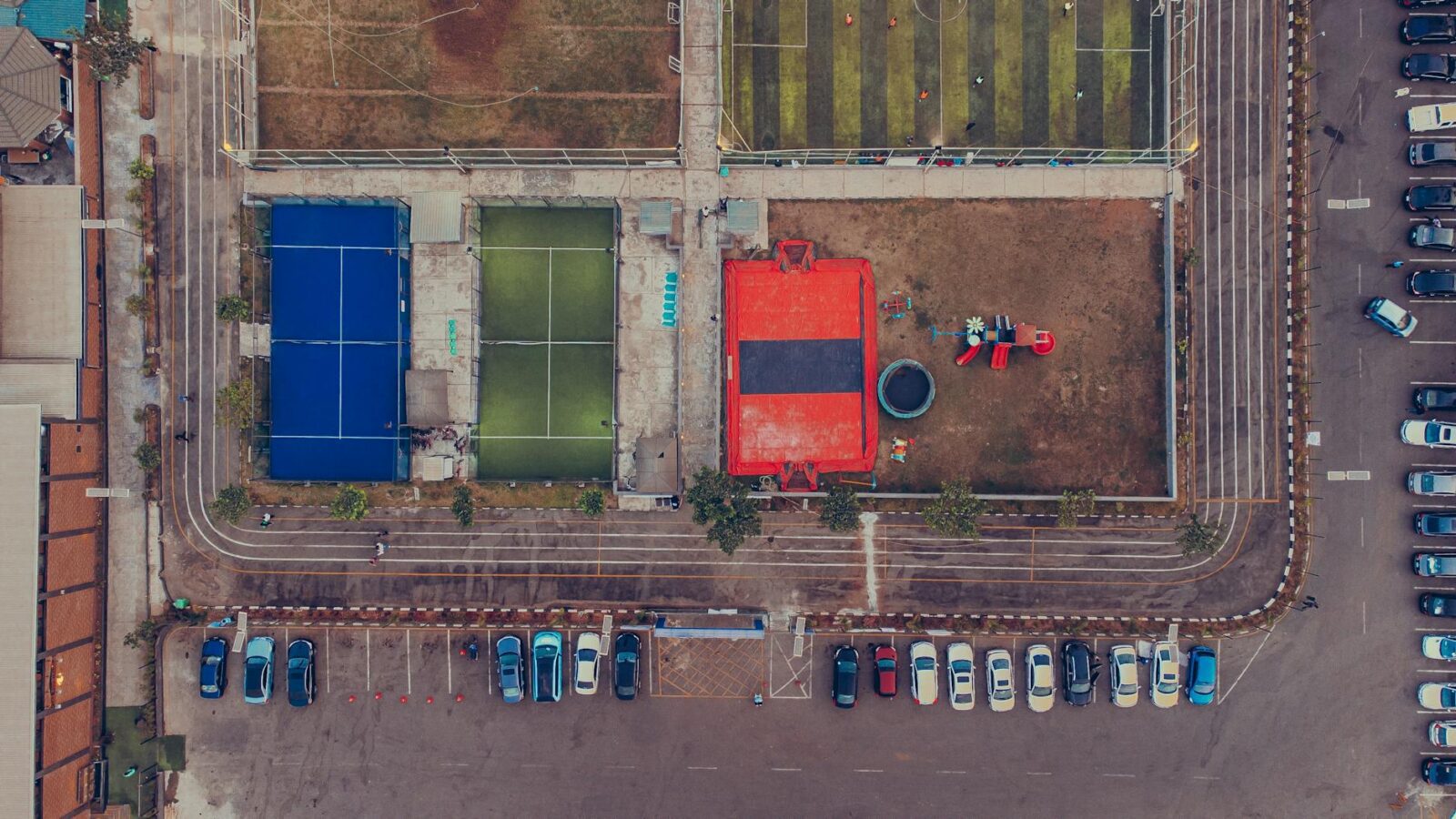 aerial view of urban sports complex with parking