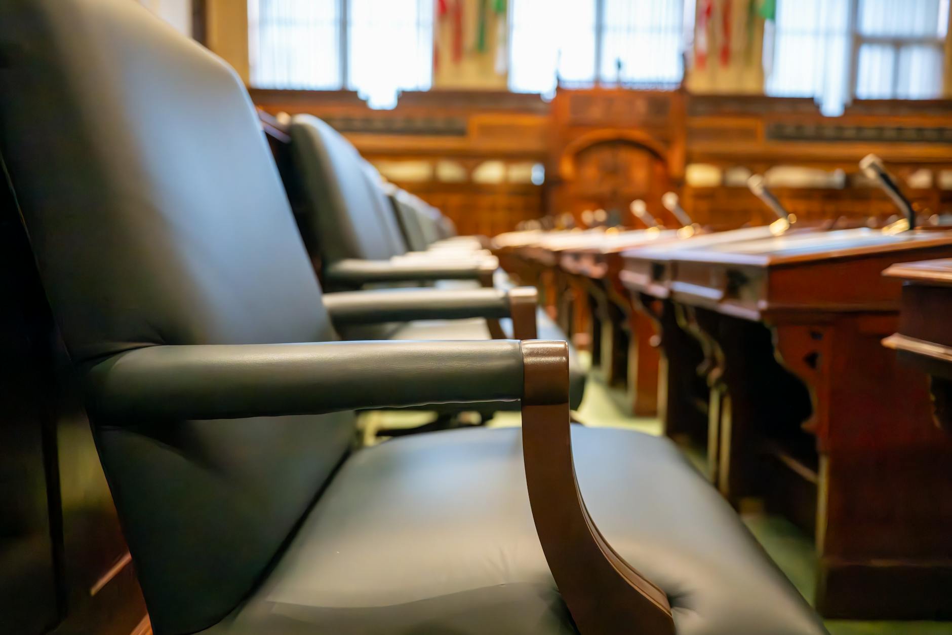 luxurious seats in an elegant courtroom When to Hire an Attorney: Legal Guidance for Life’s Unexpected Moments
