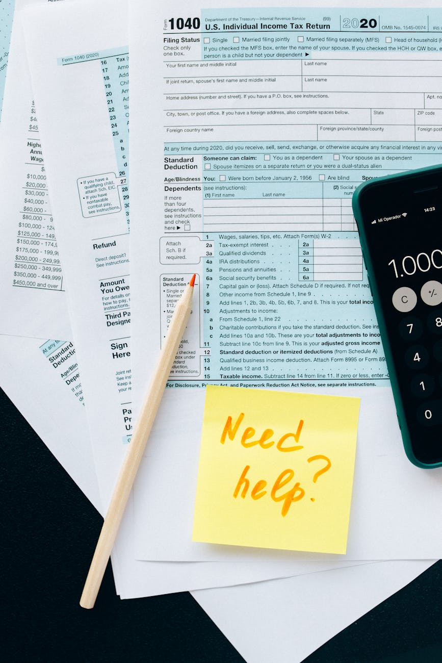tax documents on the table When to Hire an Attorney: Legal Guidance for Life’s Unexpected Moments