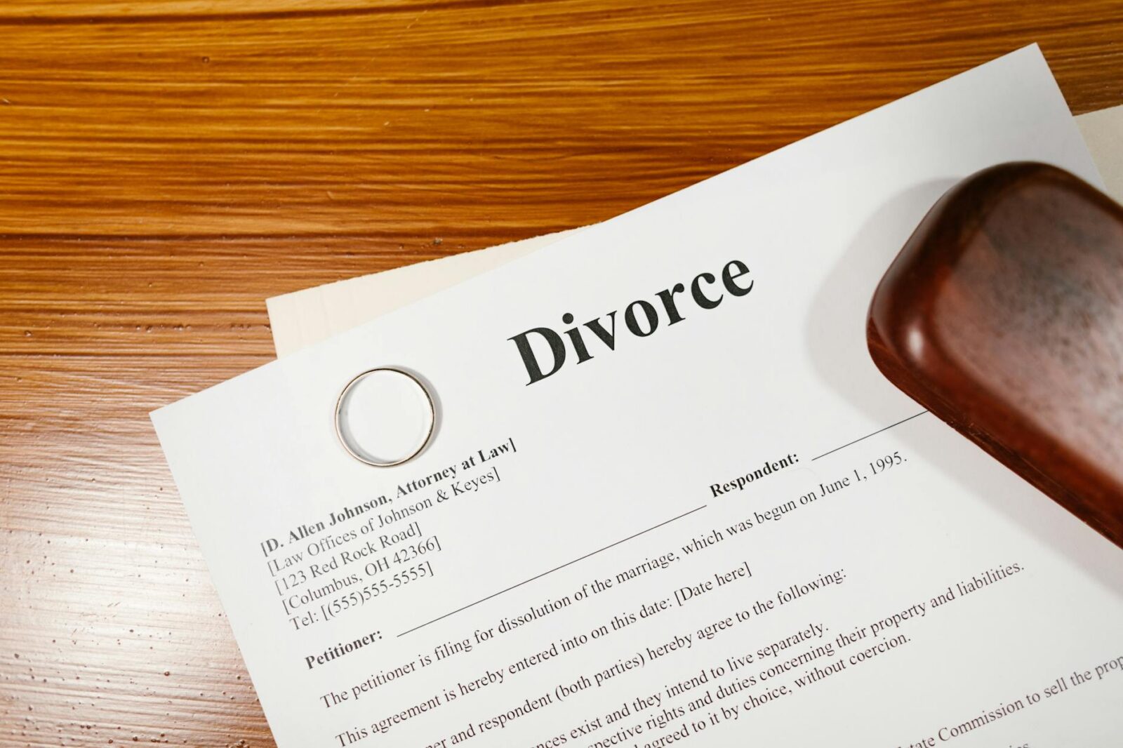 white printer paper on brown wooden table 9 Times You Need A Lawyer In Your Life
