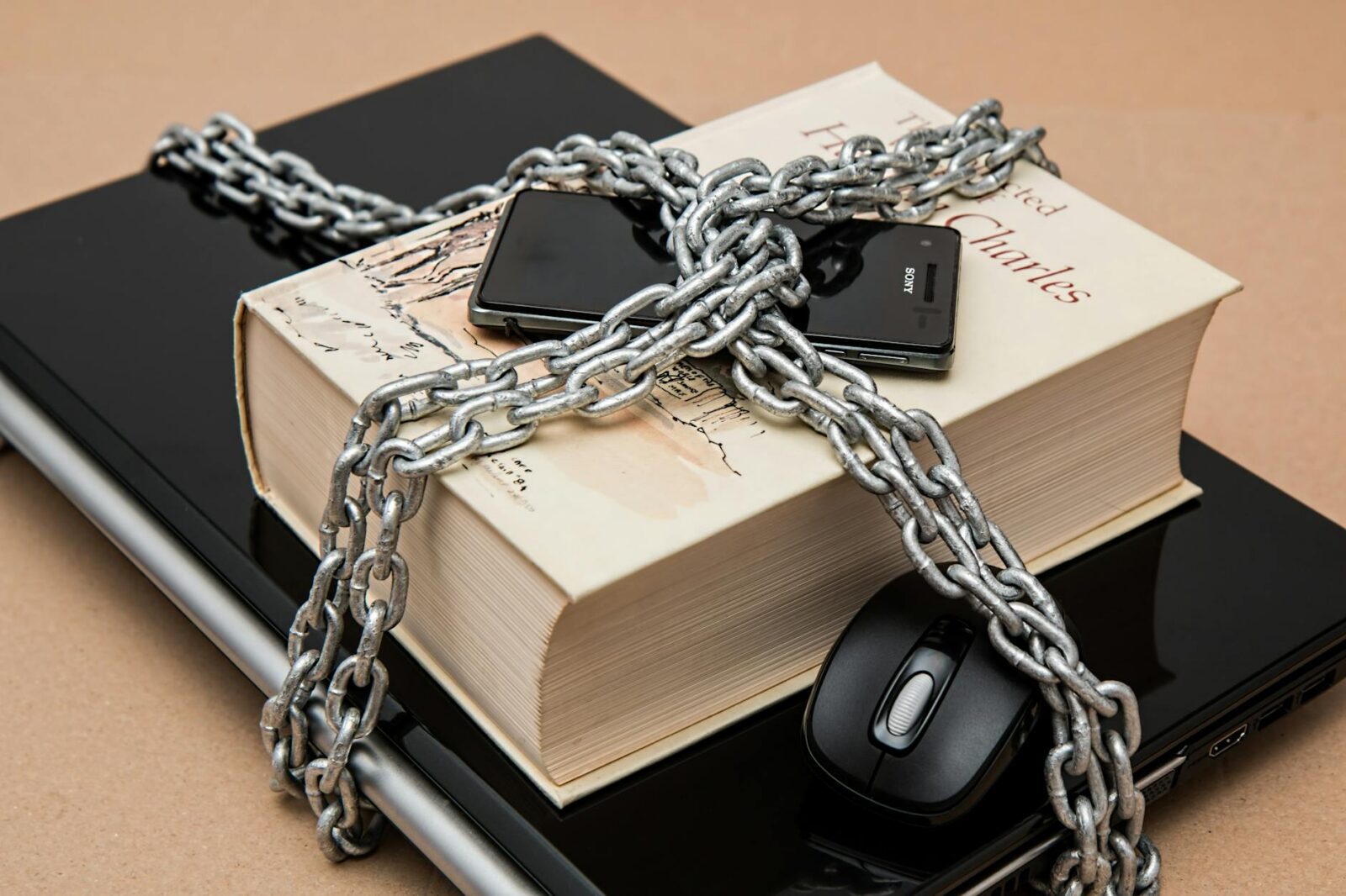 black android smartphone on top of white book 5 Common Legal Issues Small Business Owners Face
