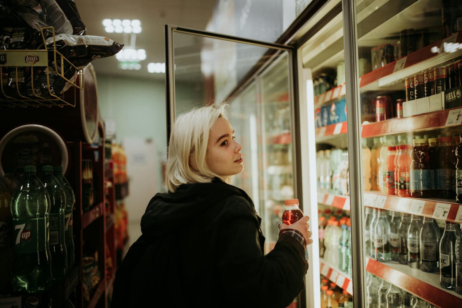 woman buying a drink Shaving Dollars From Your Grocery Bills: Shopping Tips to Save Money