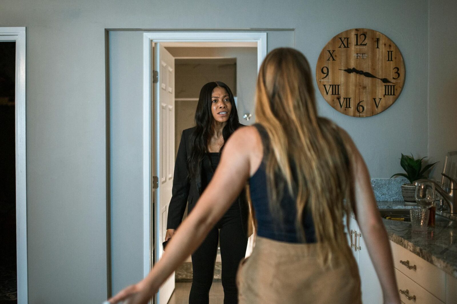 women fighting inside the house Budgeting for Shared Living: What to Expect and How to Split Costs