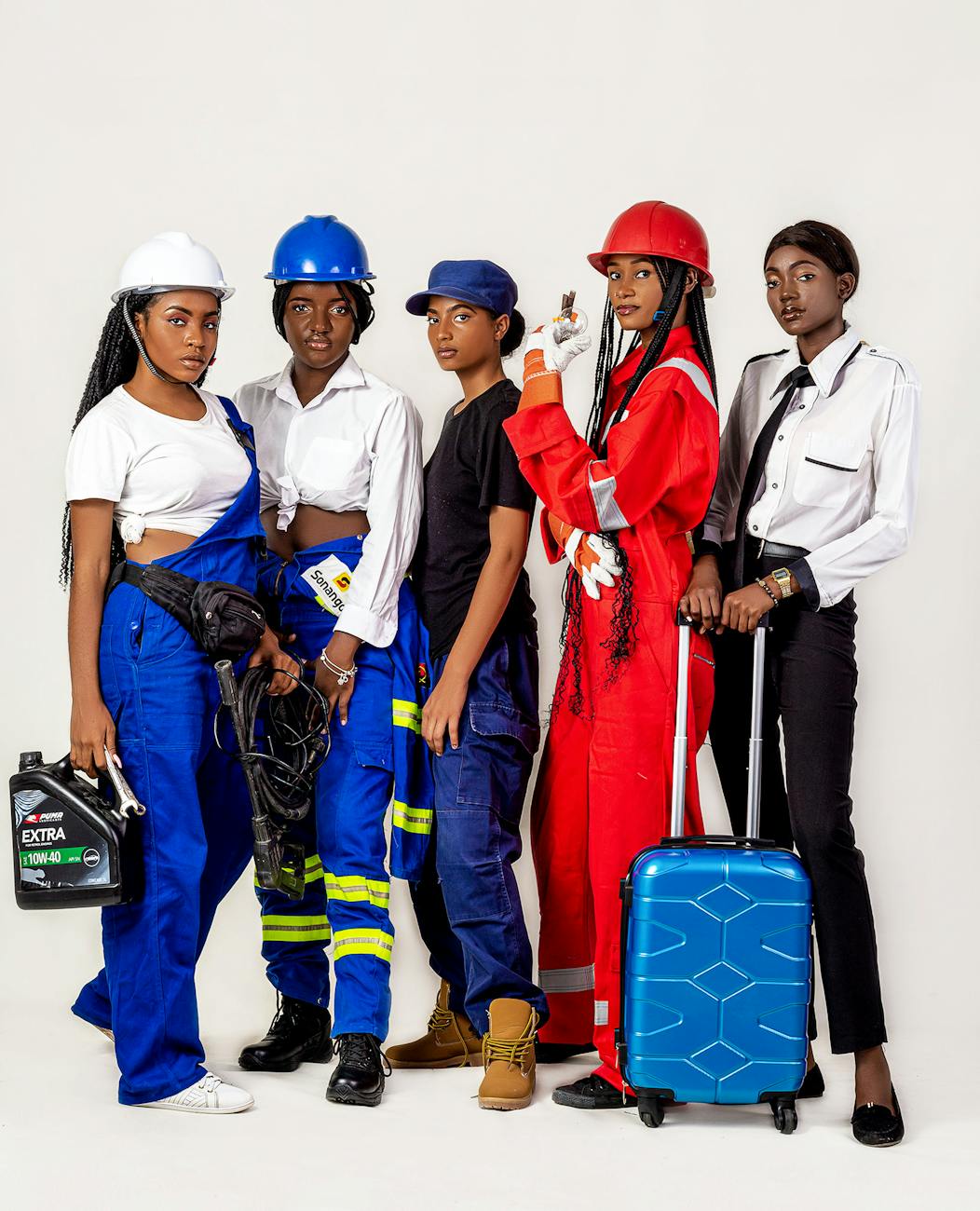 women in a variety of uniforms From Manicures to Multimeters: Rethinking What a Career Looks Like