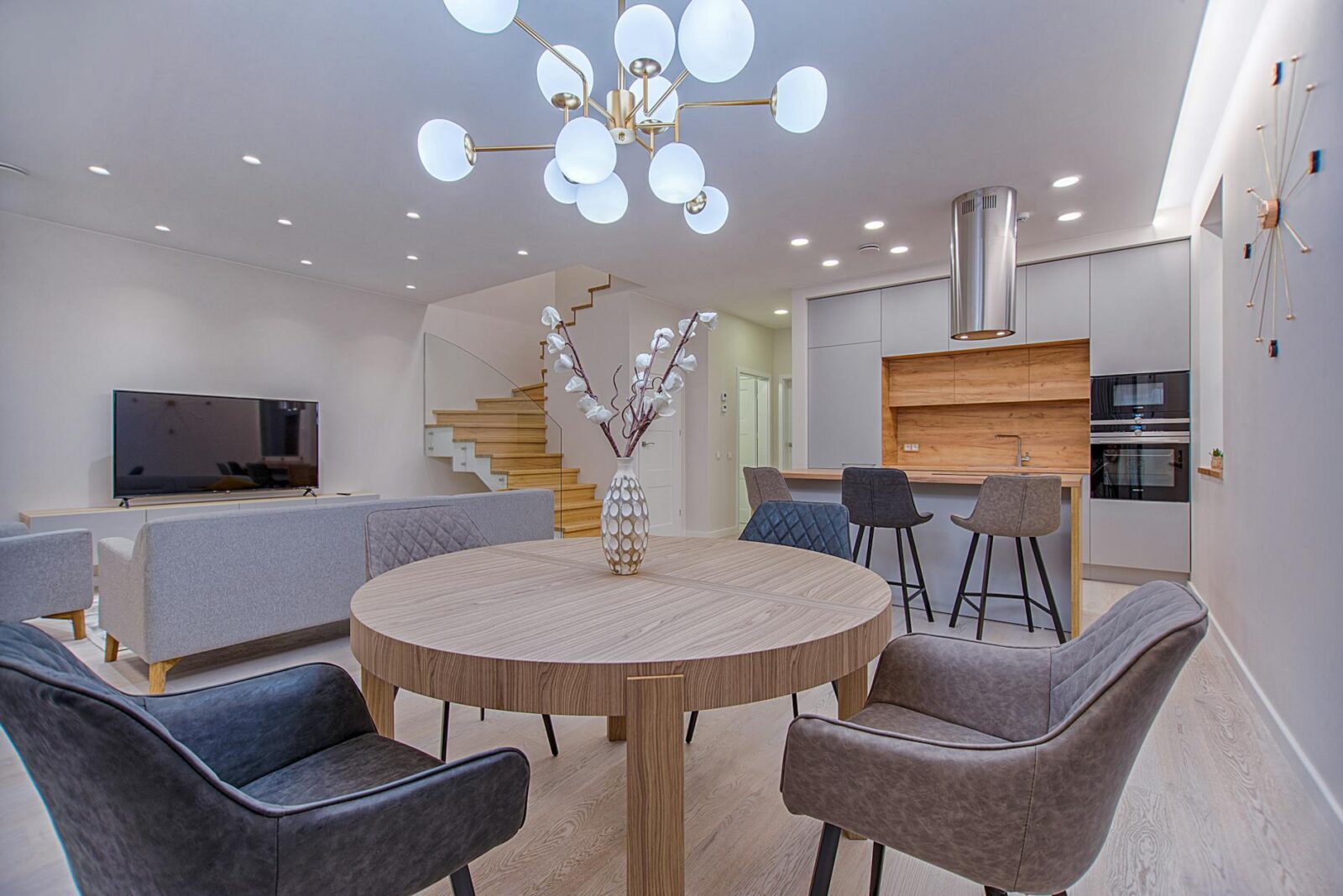 round brown wooden table with chairs inside room 5 Easy Home Design Tips to Refresh Your Space