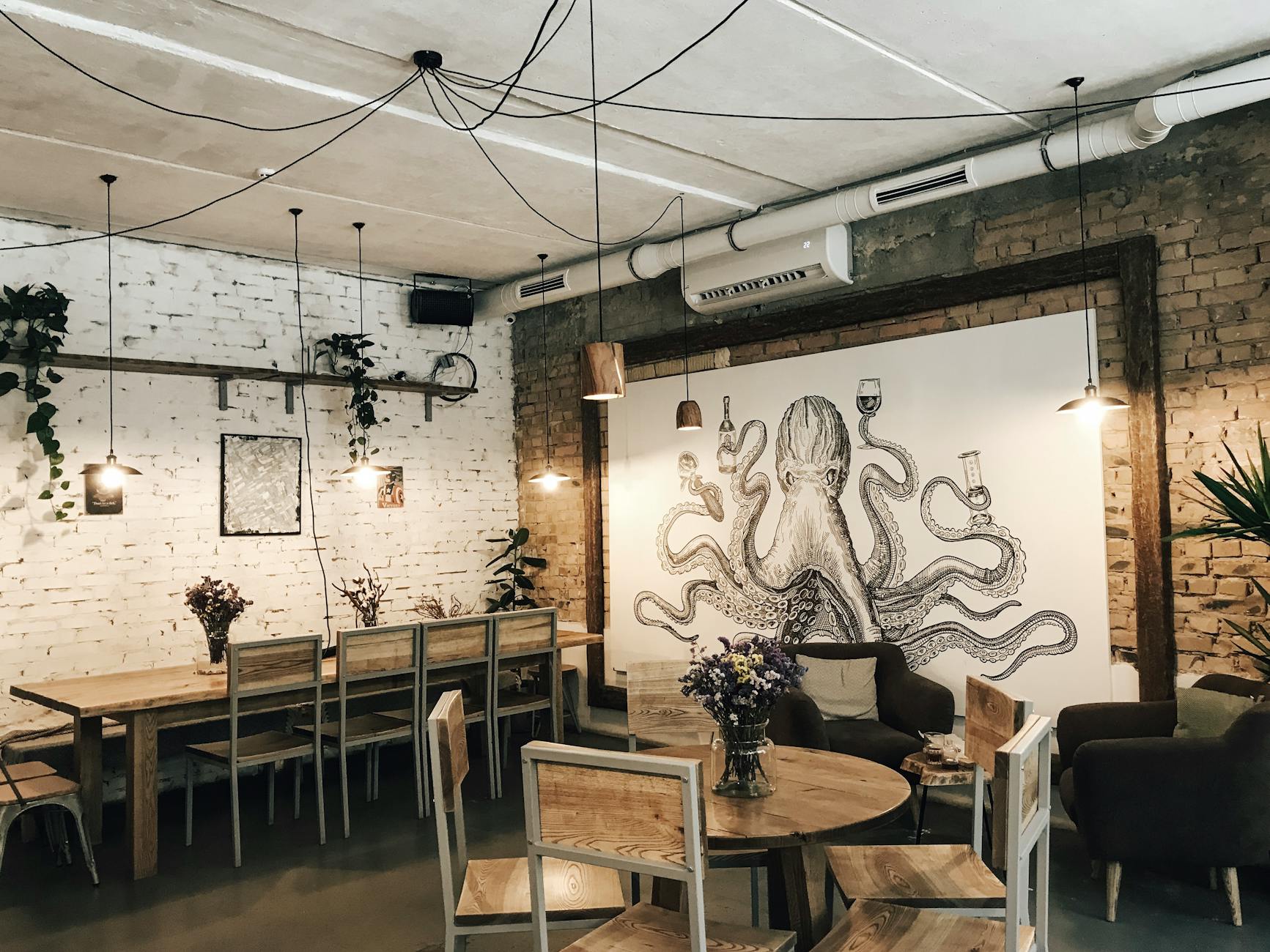 grey octupos painting How Custom Table Bases Elevate Dining Room Aesthetics