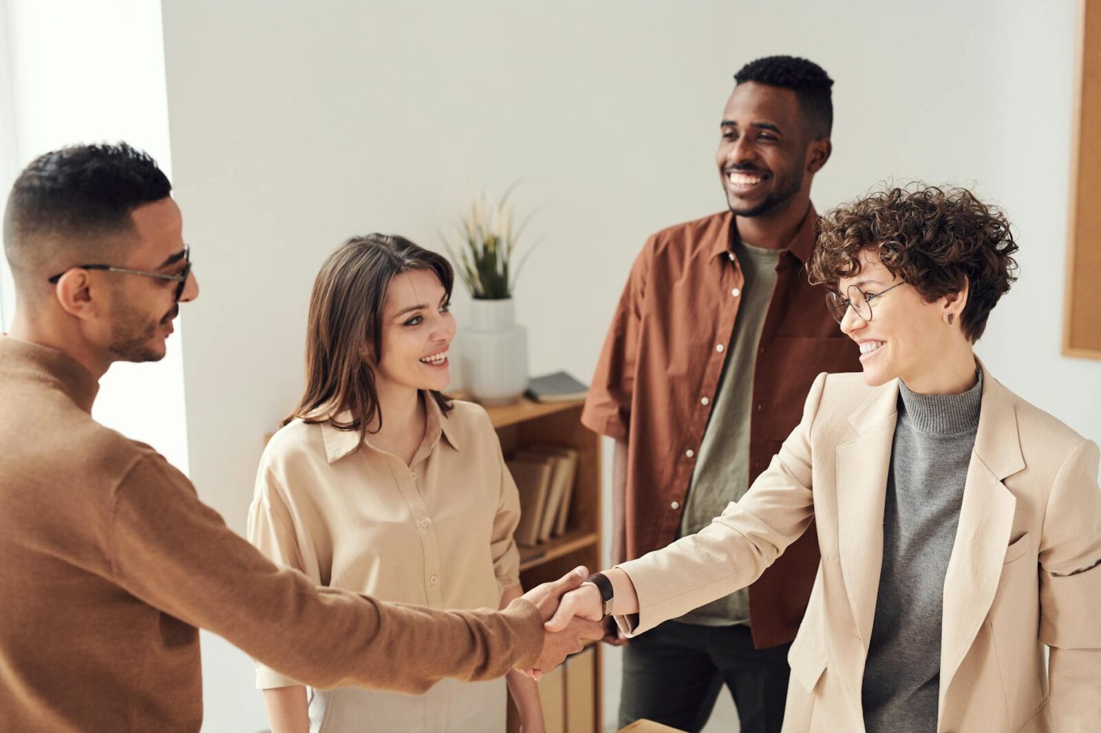 photo of people doing handshakes 4 Important Aspects Of Running A Successful Business
