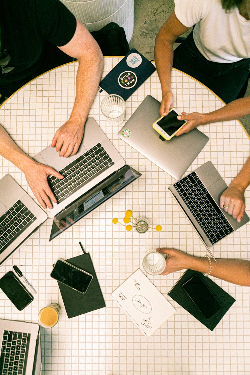 photo of people using laptop 4 Important Aspects Of Running A Successful Business