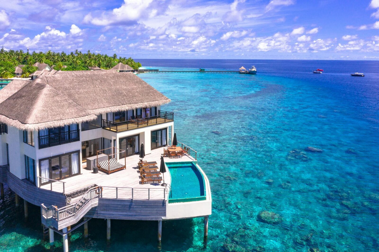 photo of sea during daytime What Makes a Market “Elite”: High-End Vacation Rental Investment Hubs