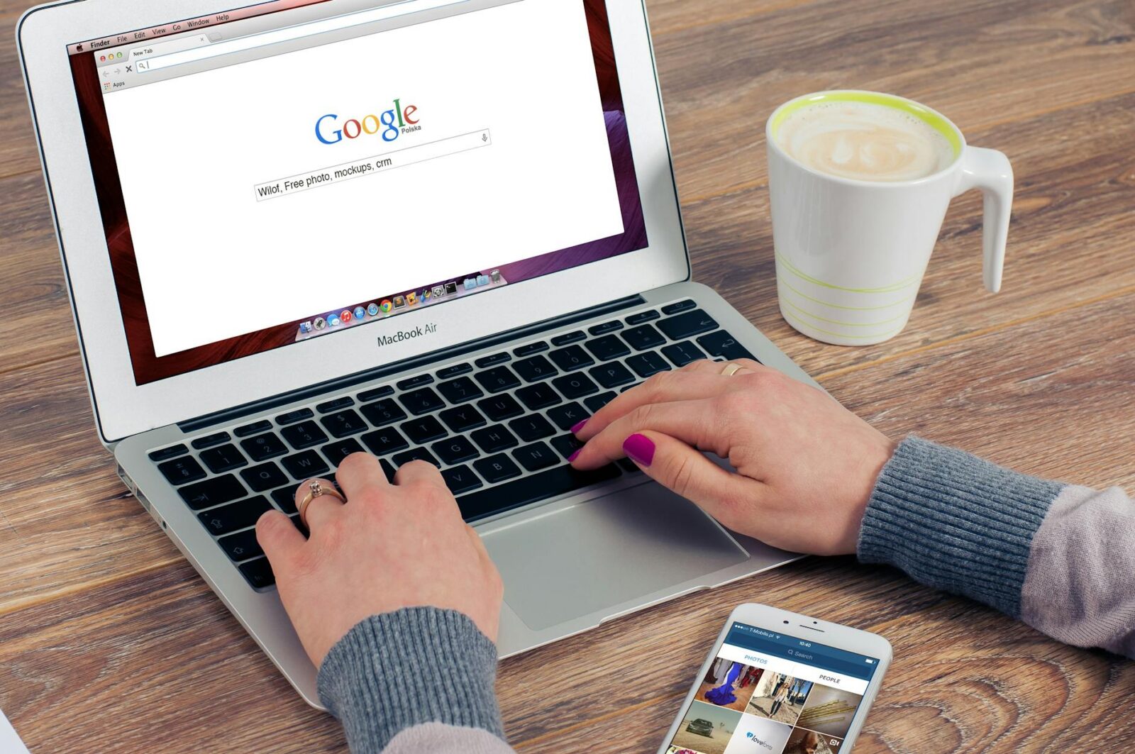 person using macbook air 10 Proven Ways to Increase Your Business Visibility Online and Offline