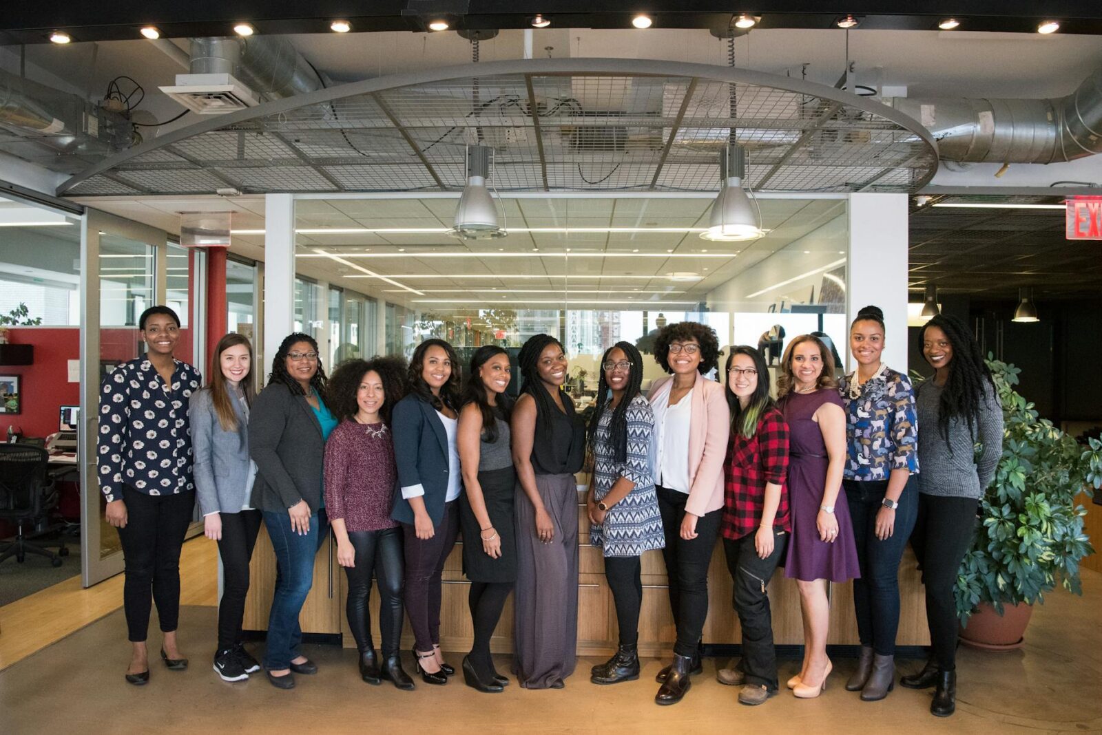 group of women standing near desk How To Take Control Of Your Business & Achieve More Success