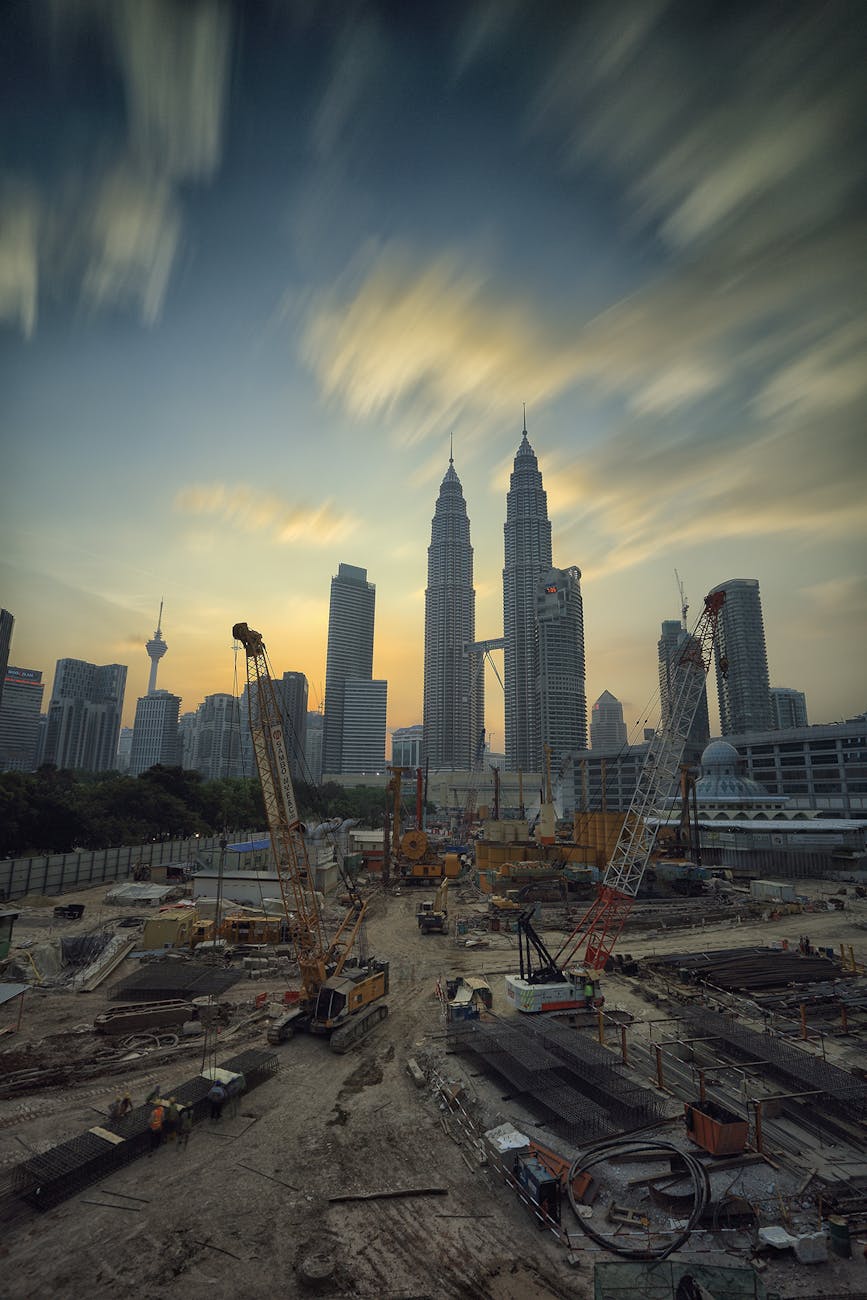 yellow tower crane How to Become a Successful Real Estate Developer: 11 Essential Steps