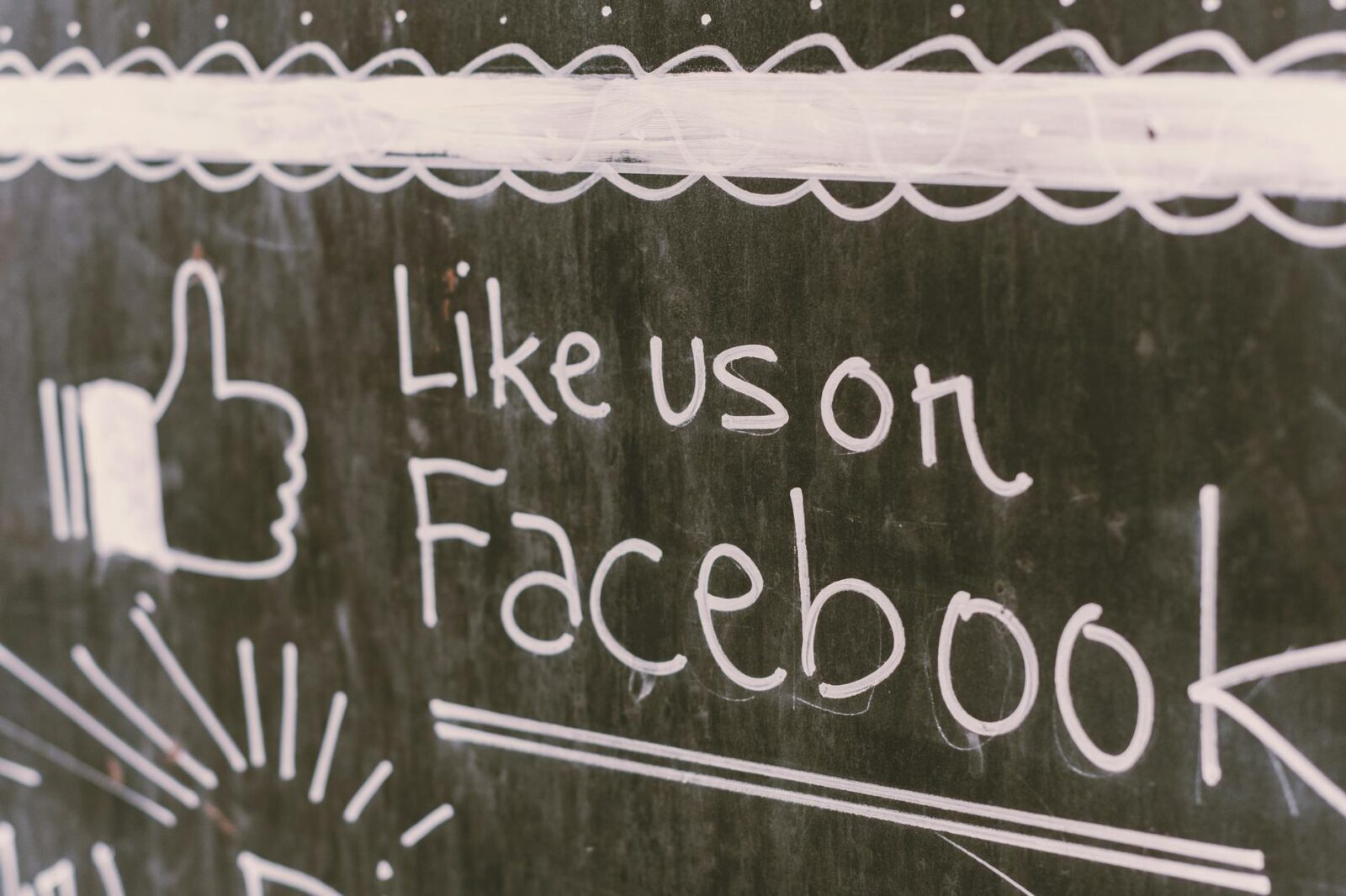 chalkboard social media promotion graphic 5 Essential Strategies to Build Brand Visibility Long-Term