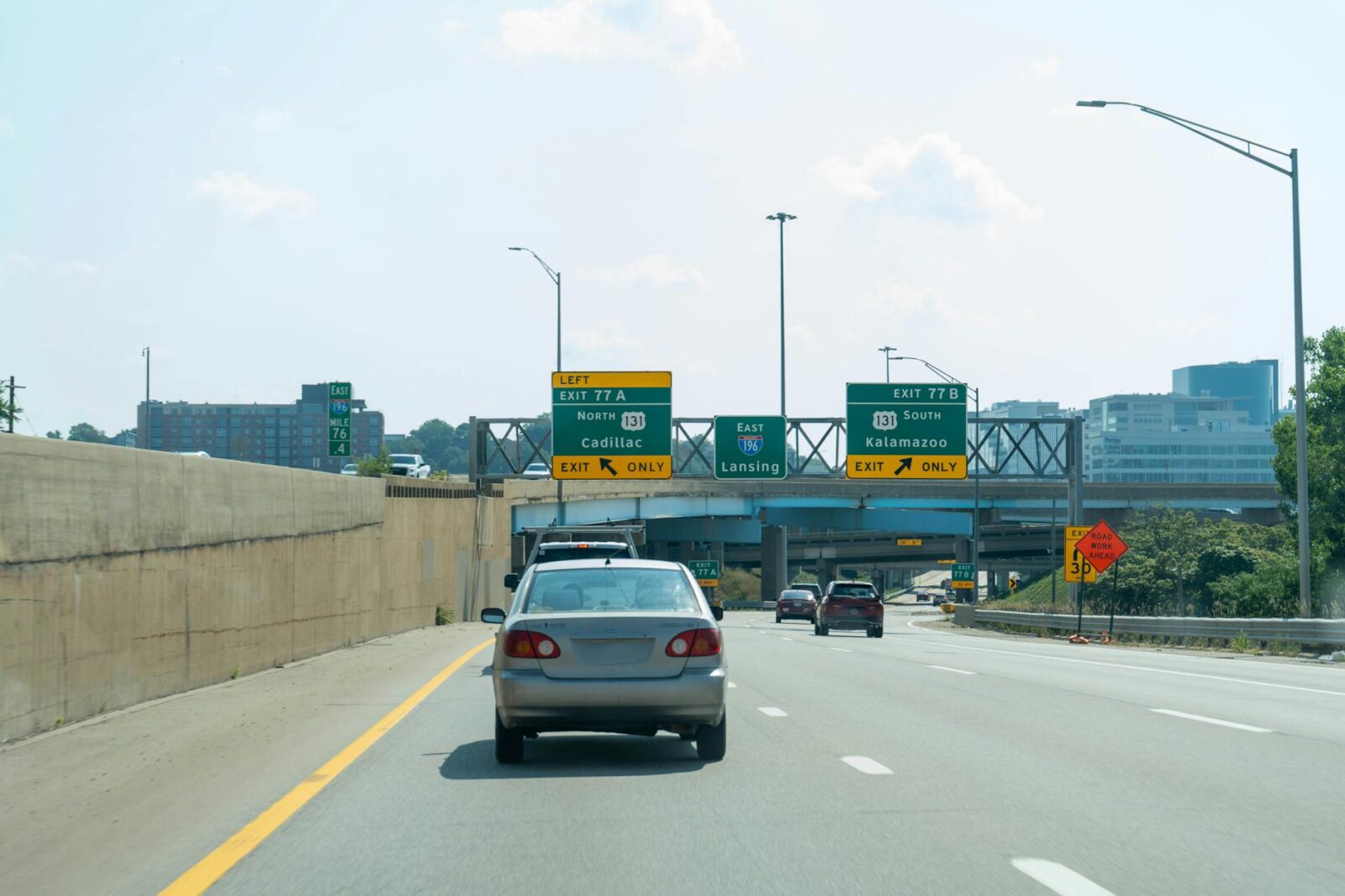 bustling highway overpass in grand rapids michigan Moving to Michigan: Migration Trends and Top Destinations