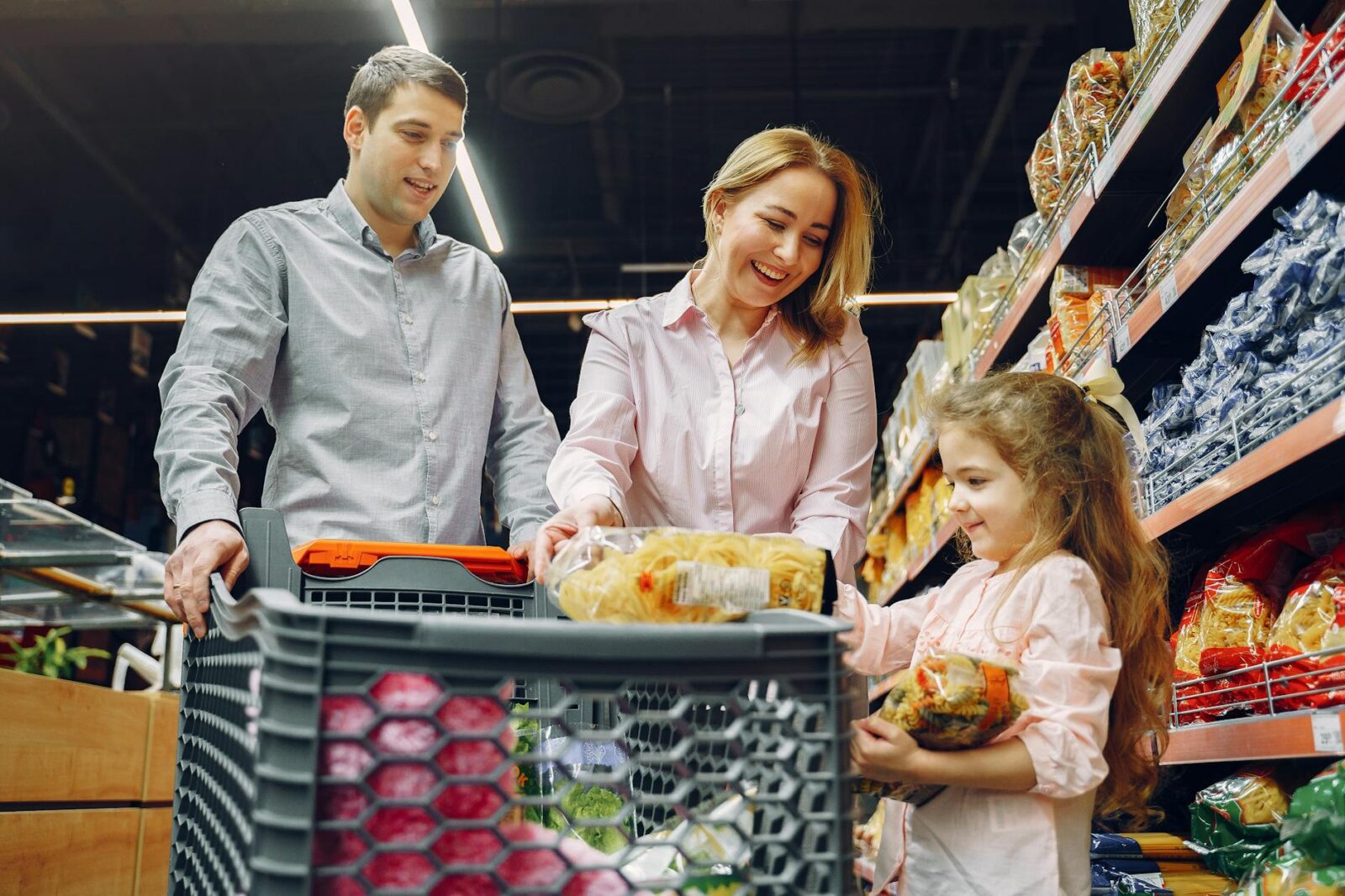 family doing grocery shopping Smart Spending: How To Cut Costs Without Sacrificing Quality