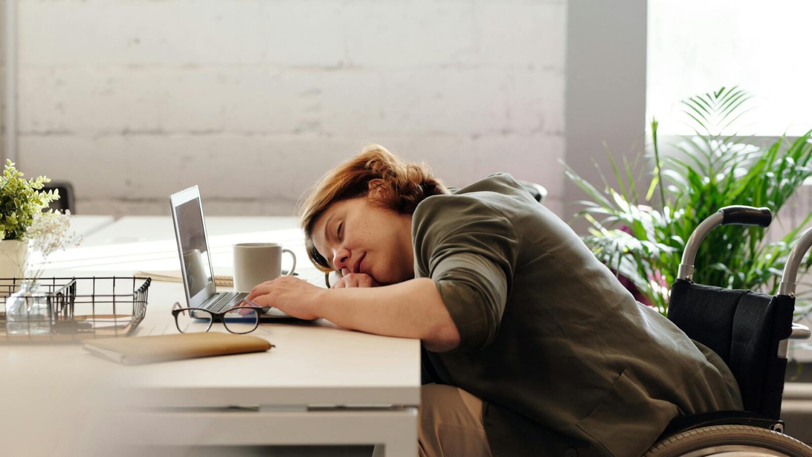 woman leaning on her table Menopause Management: 4 Empowering Tips Every Woman Should Know