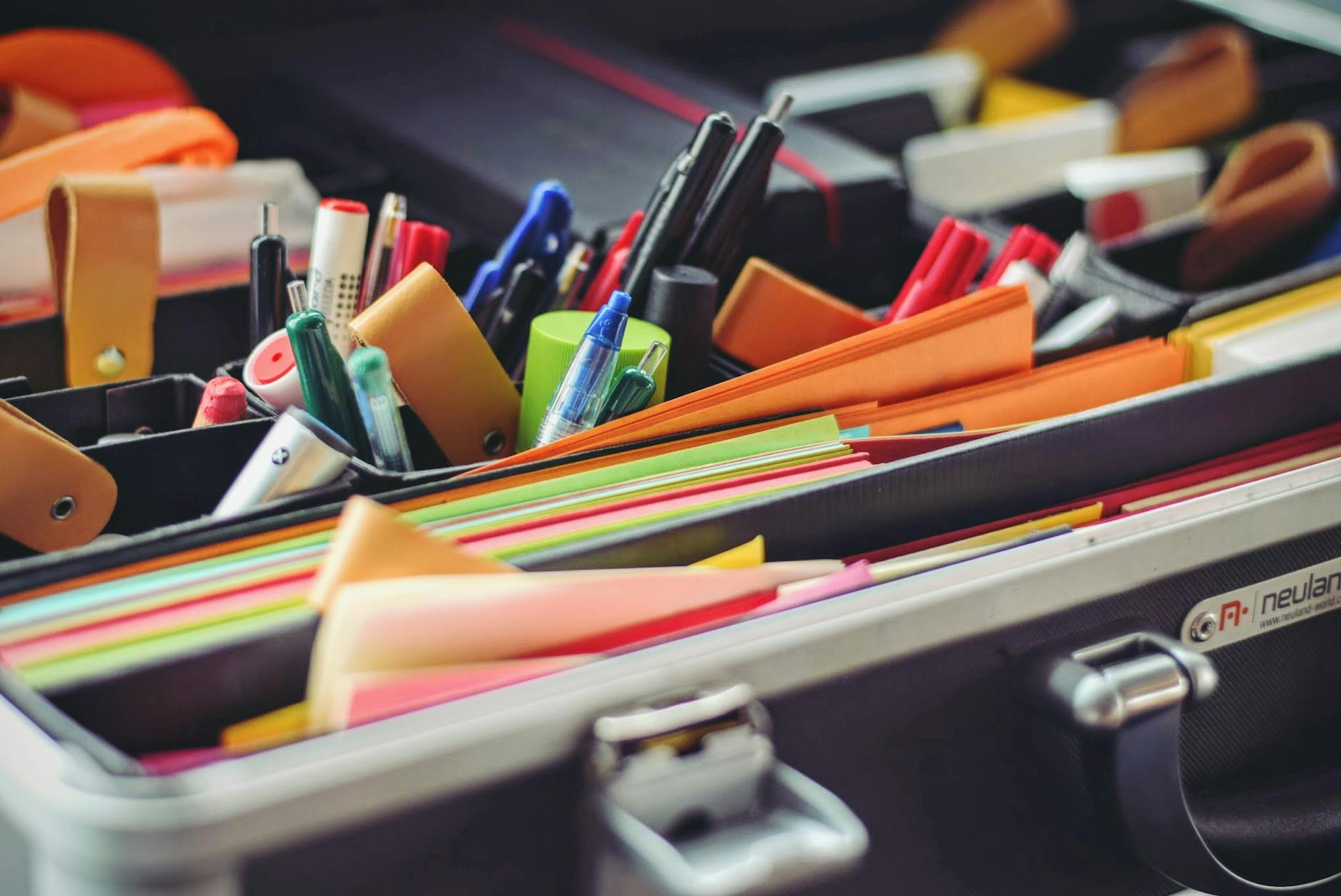 pens and markers on case Boost Office Efficiency: Uncover Hidden Workflow Bottlenecks