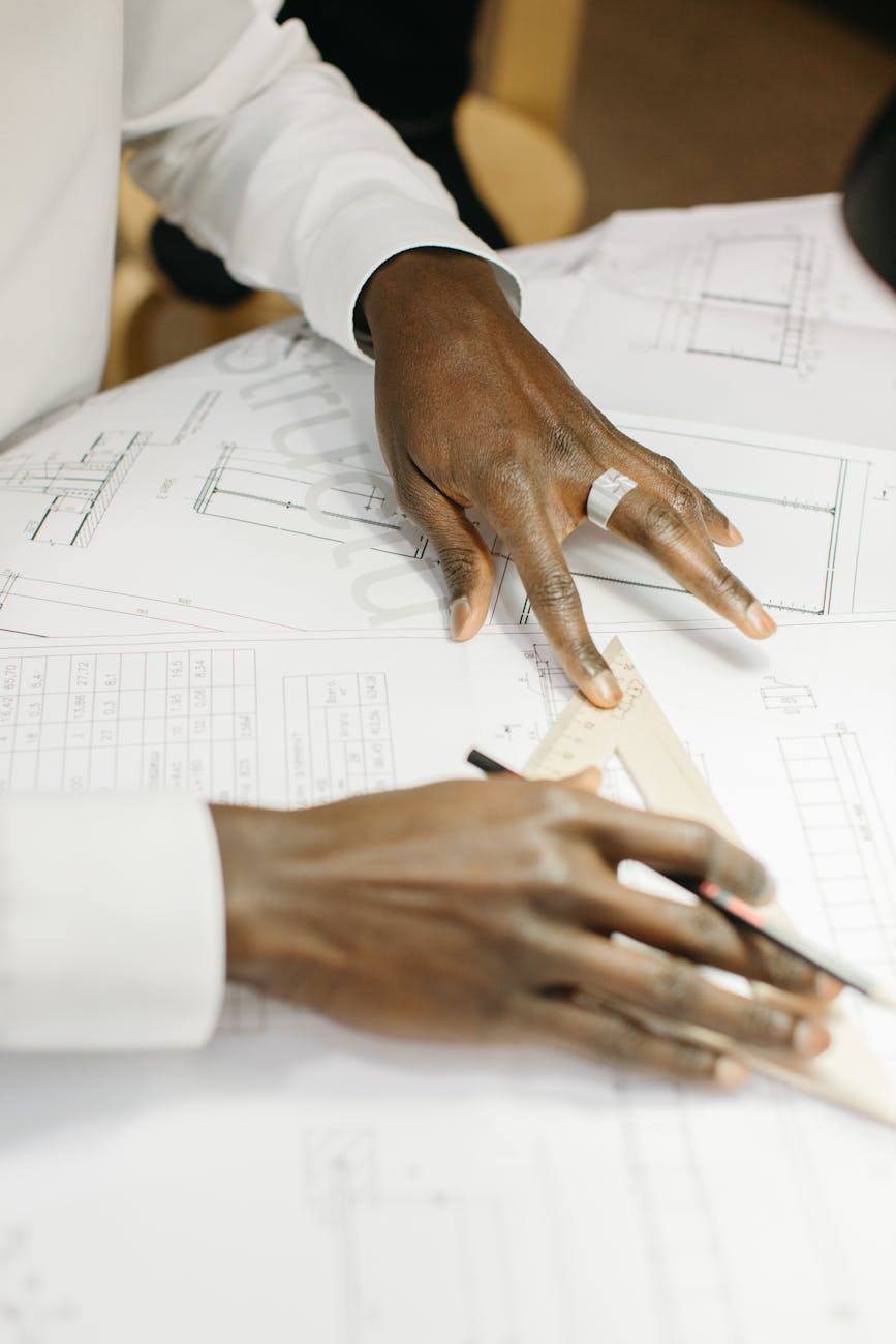architect making a plan How to Become a Successful Real Estate Developer: 11 Essential Steps