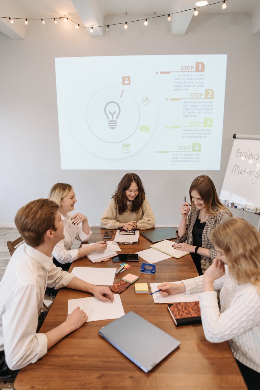 people having a business meeting Are You Struggling With Your Business? How to Fix It and Grow Stronger