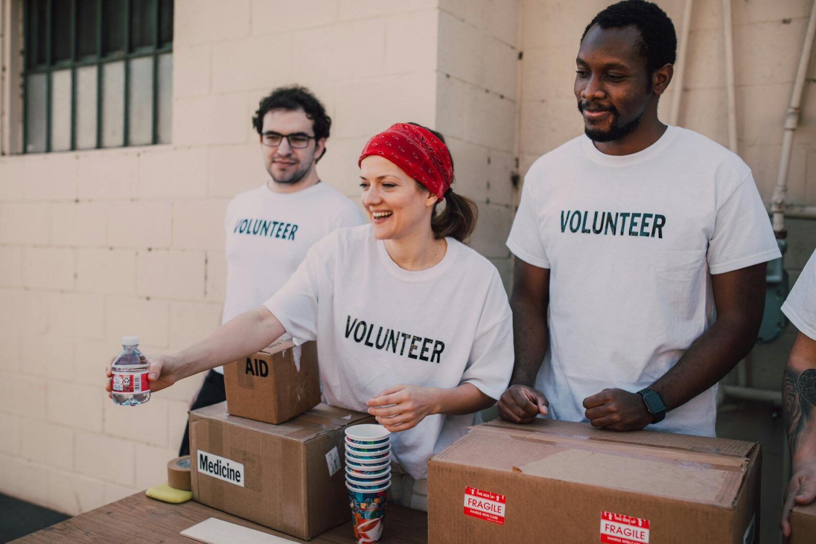 three people donating goods How to Plan a Successful Career Path