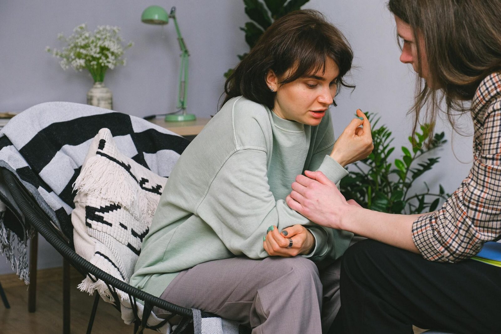 crop counselor supporting patient during dialogue indoors Why Having the Right Support Makes Workplace Recovery Easier