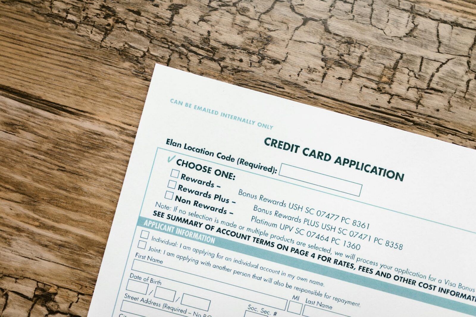 white printer paper on brown wooden table Smart Spending: How To Cut Costs Without Sacrificing Quality