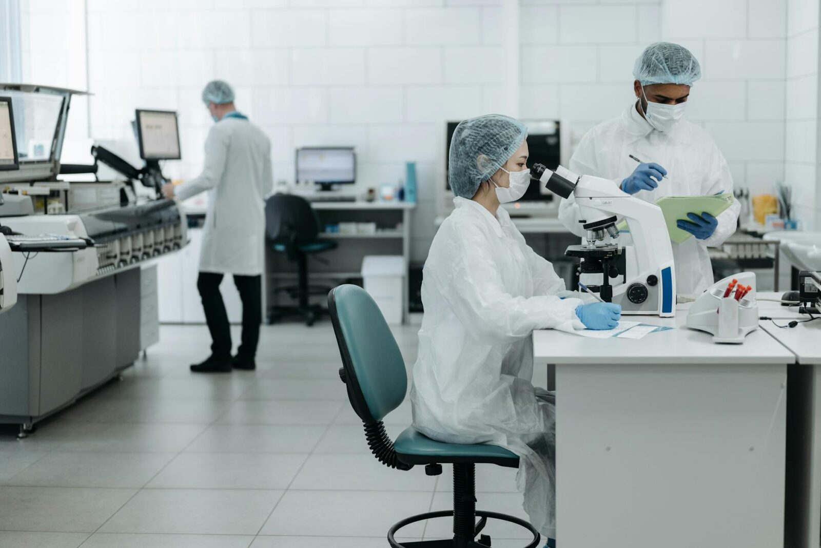 scientists in a laboratory The Role of Workplace Safety in Driving Business Success