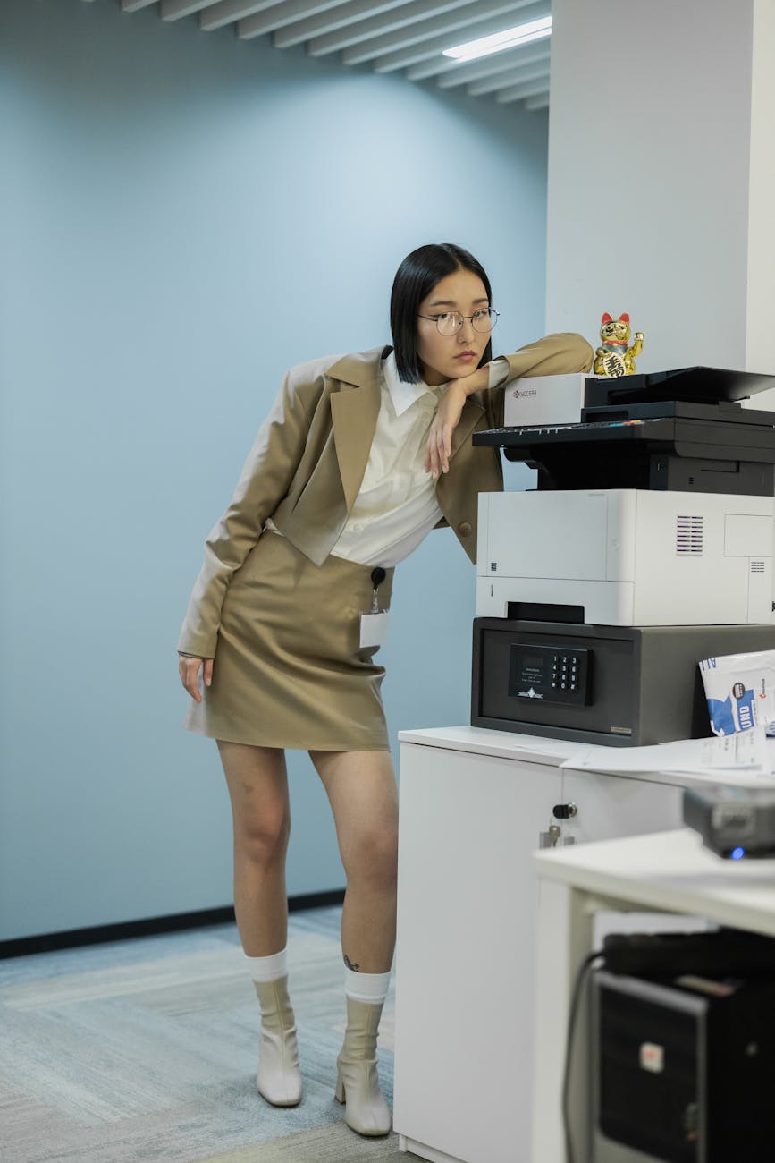 a woman in an office Boost Office Efficiency: Uncover Hidden Workflow Bottlenecks