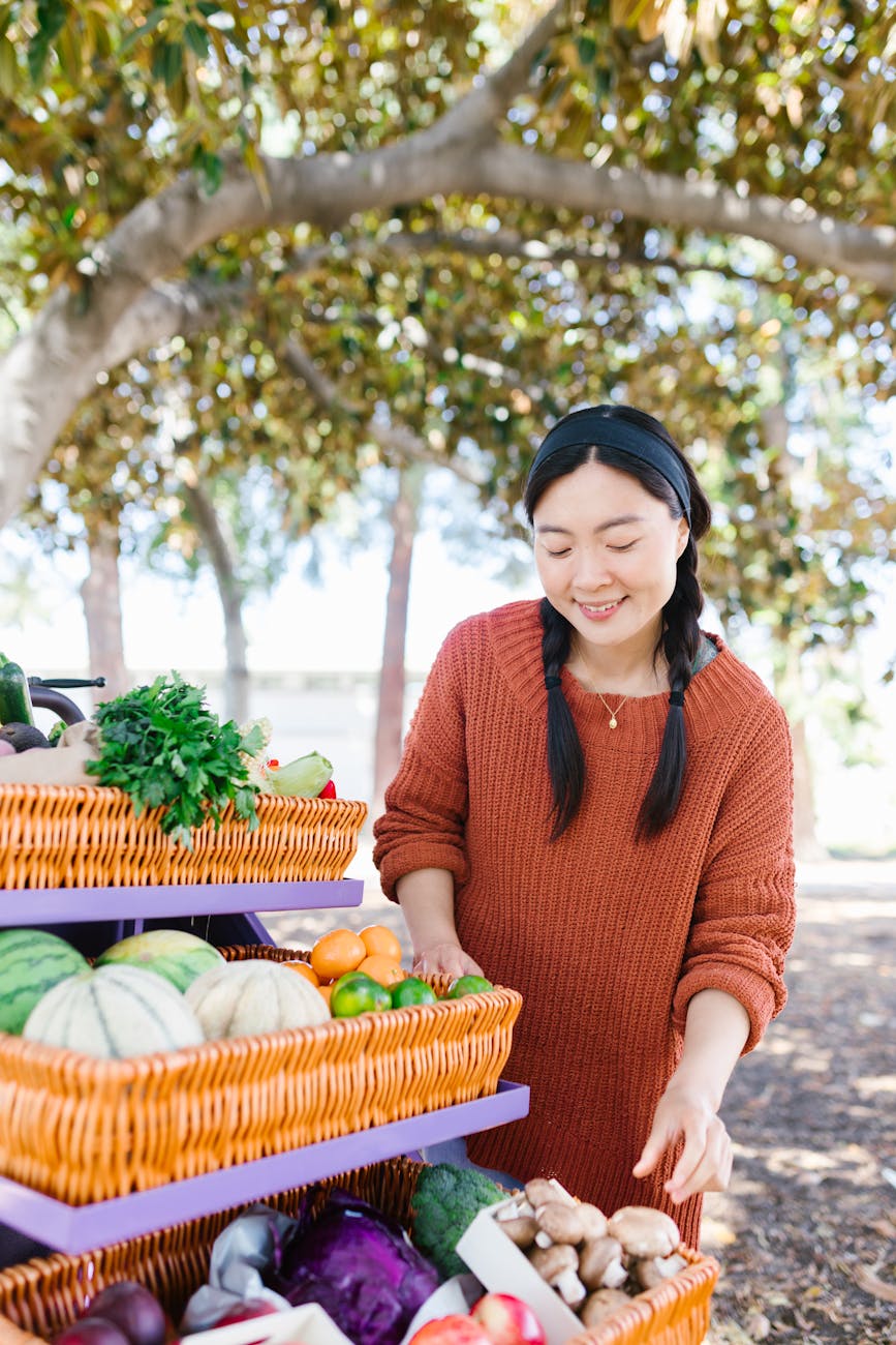 smiling woman buying vegetables Inspiring Reasons to Start Your Own Farm