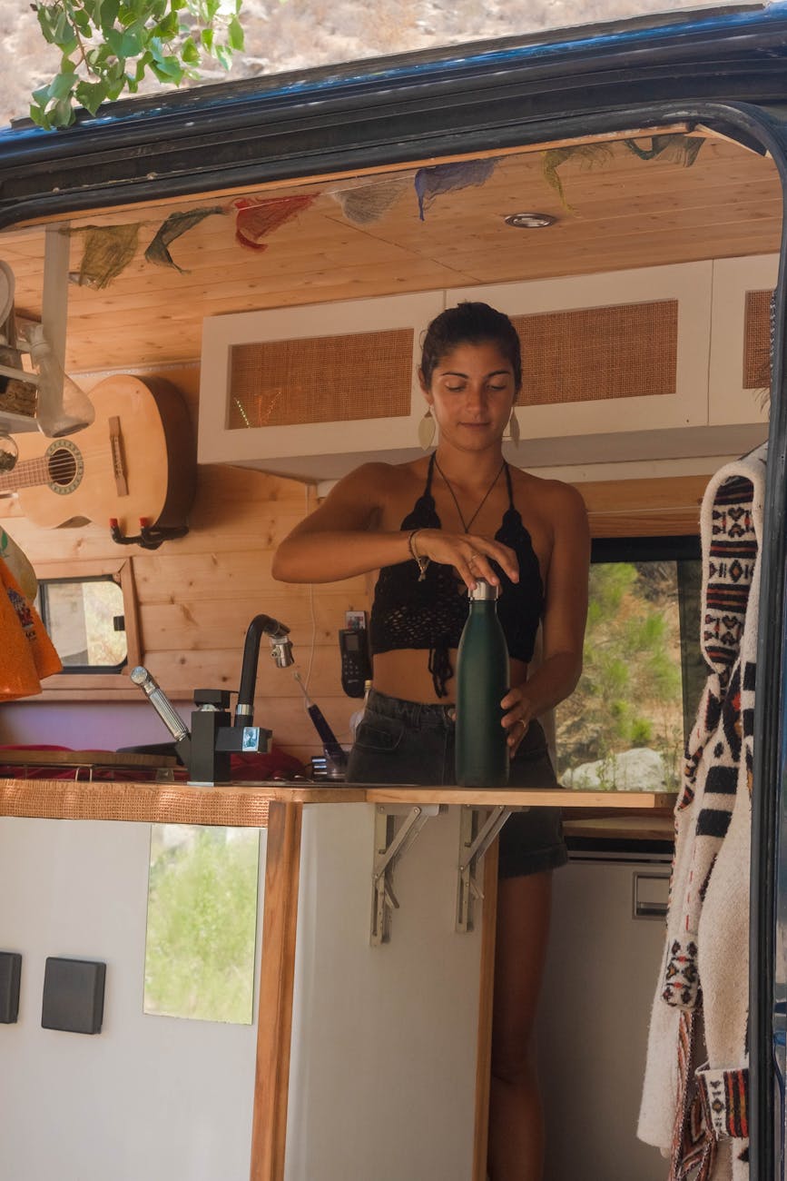 woman with bottle RV Trip Essentials: Plan an Epic Camping Adventure