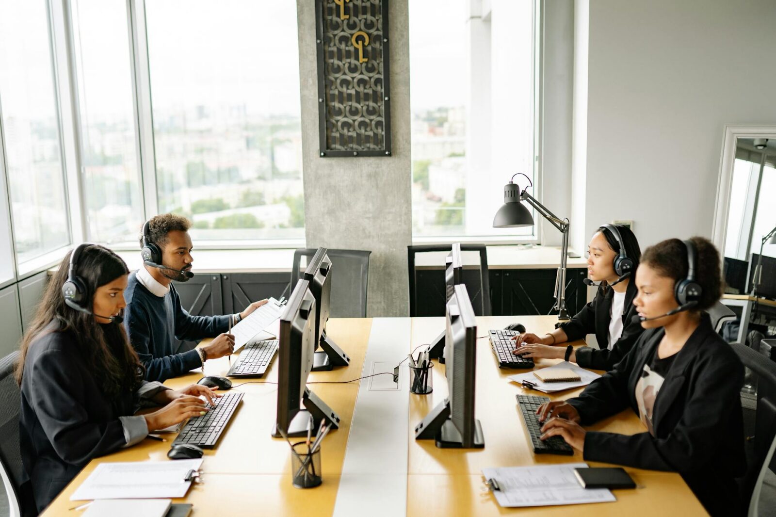 photo of busy working call center agents Are You Struggling With Your Business? How to Fix It and Grow Stronger