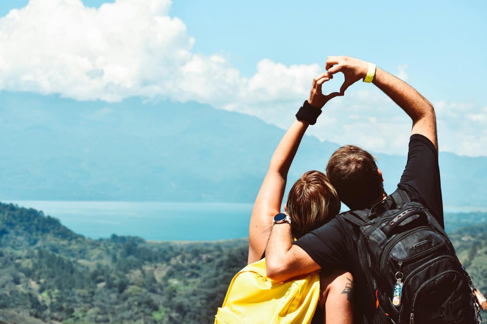 two people forming heart hand shape Why Honduras Property Investment Is a Smart Choice for Your Real Estate Portfolio