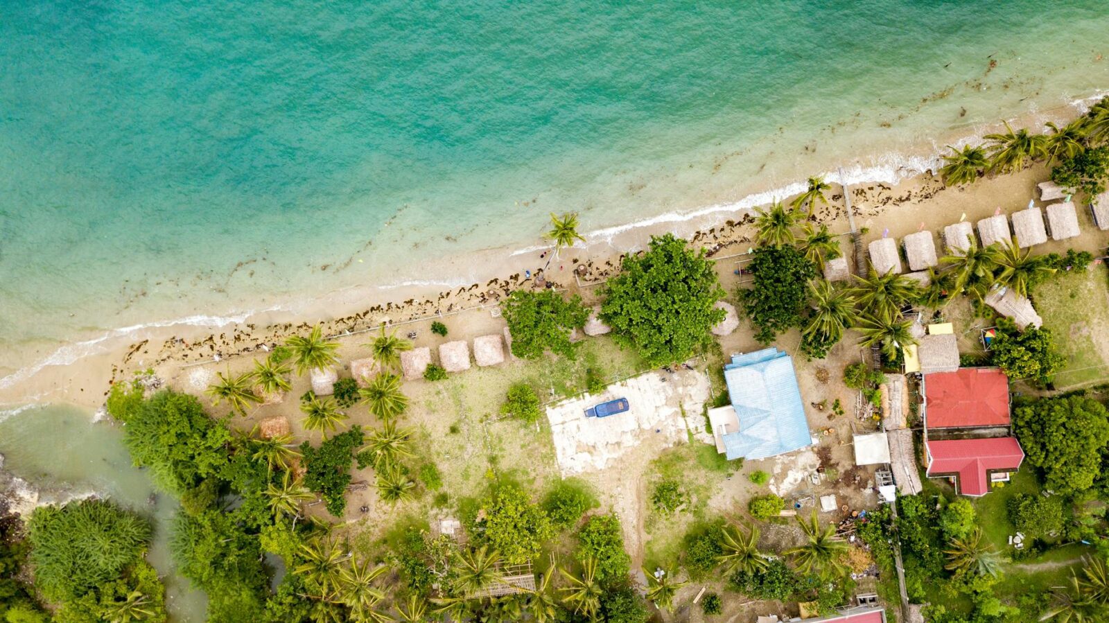 aerial photography a beach resort on a seaside Why Honduras Property Investment Is a Smart Choice for Your Real Estate Portfolio