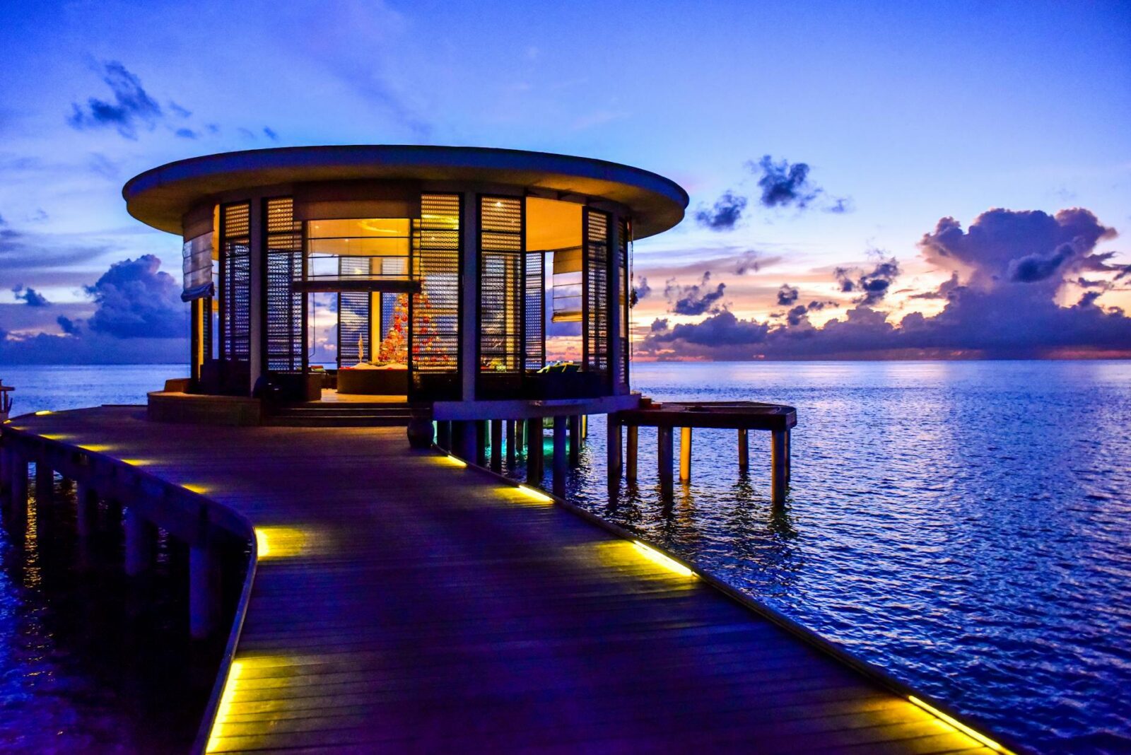 house on body of water Elevate Your Escape: Plan a Luxury Travel Experience