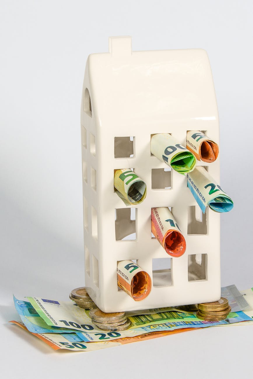 house figurine and money Top Tips for Finding the Perfect Place to Live
