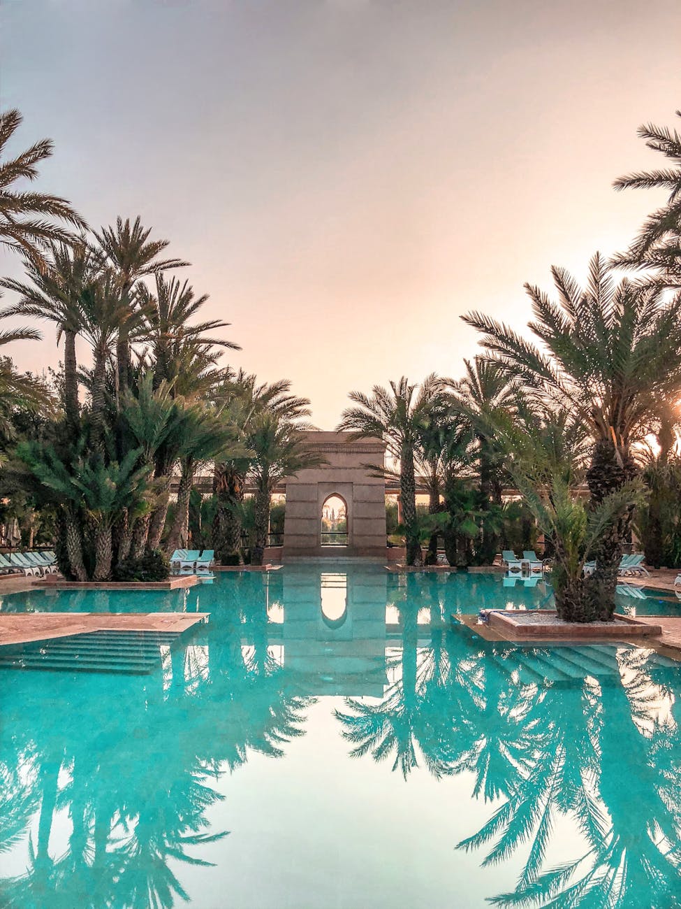 Your Ultimate Guide to Buying a Luxury Home 11 swimming pool surrounded trees Your Ultimate Guide to Buying a Luxury Home